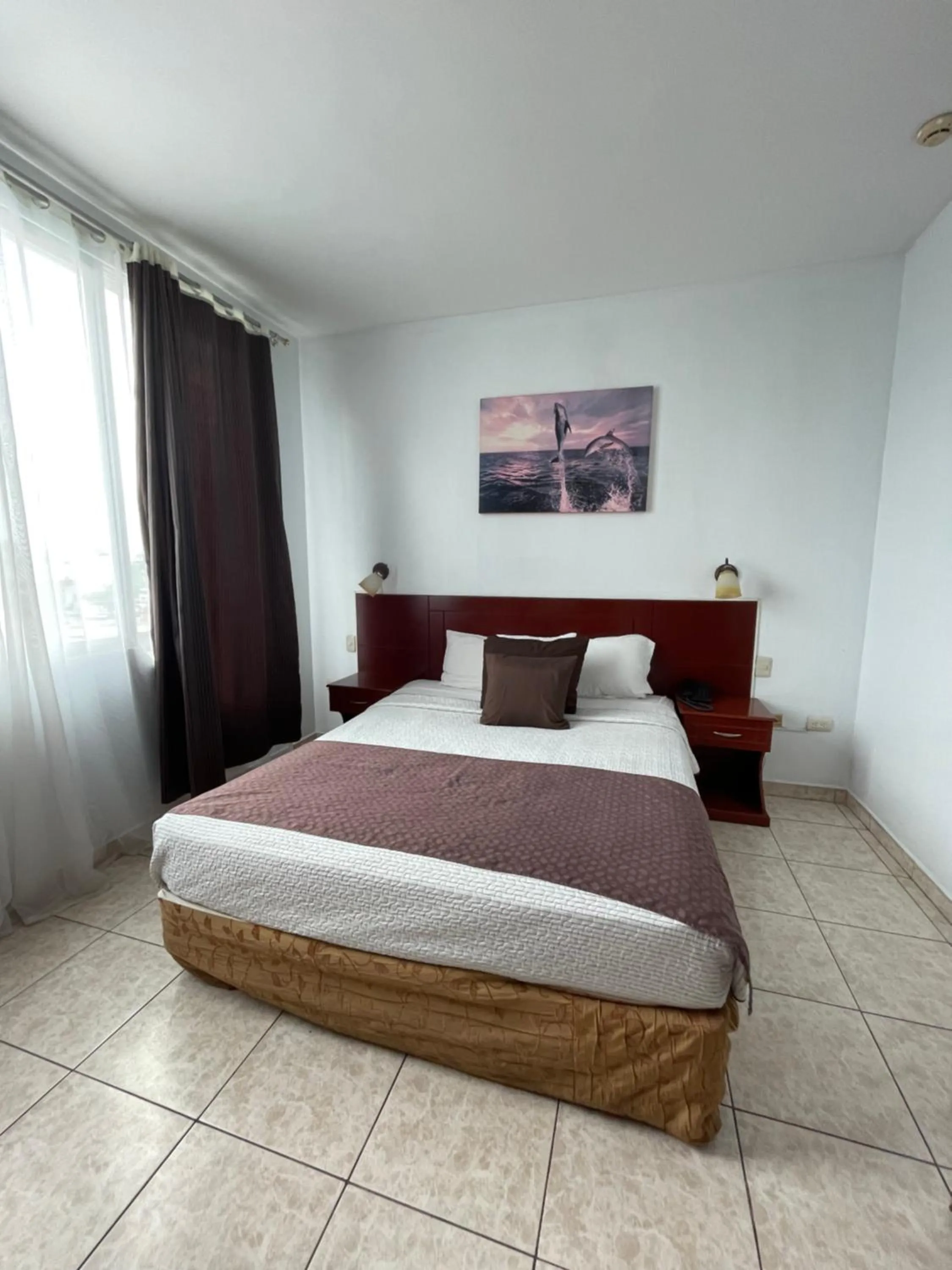 Bed in Hotel Air Suites