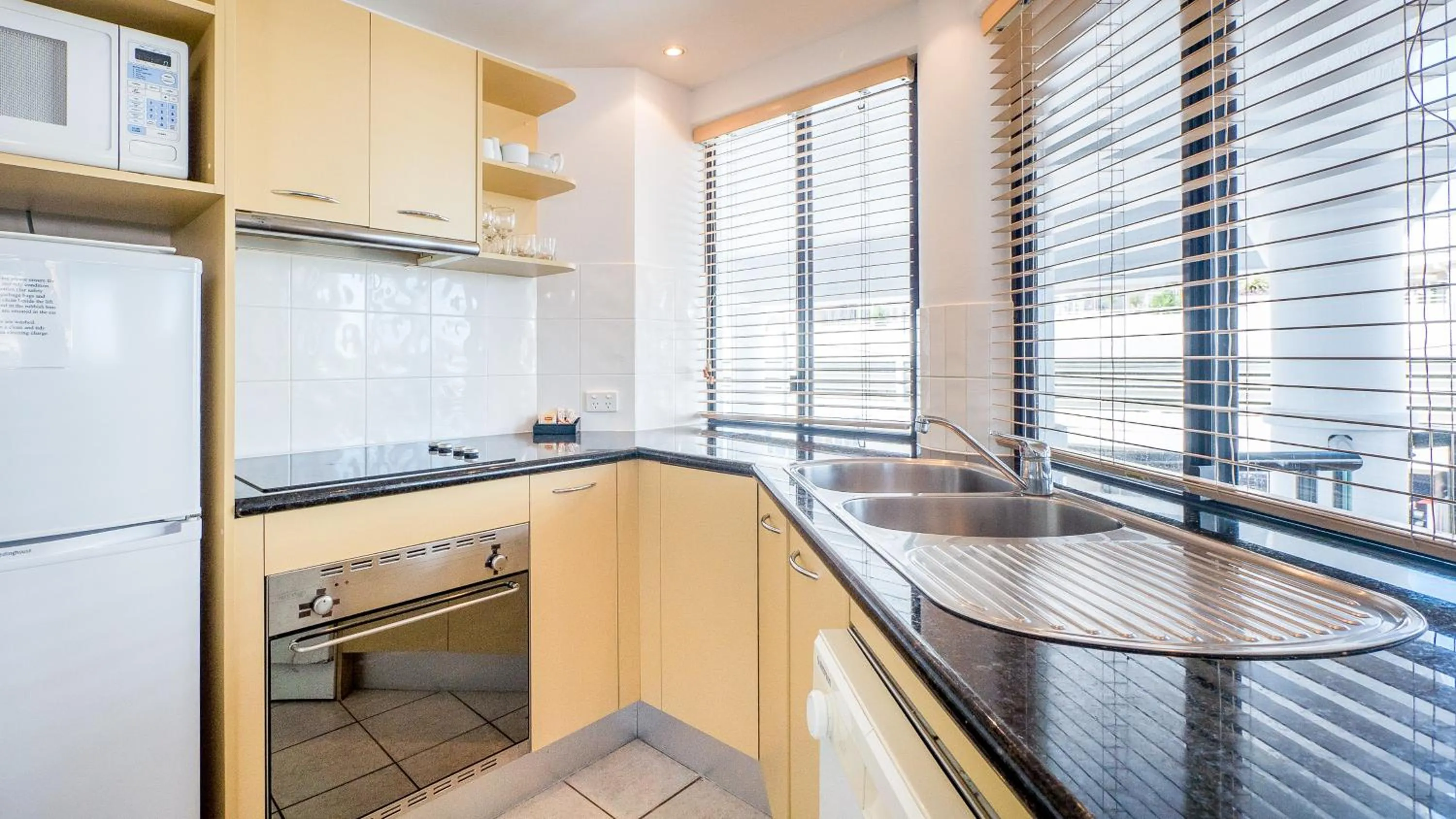 Kitchen or kitchenette in Aegean Mooloolaba