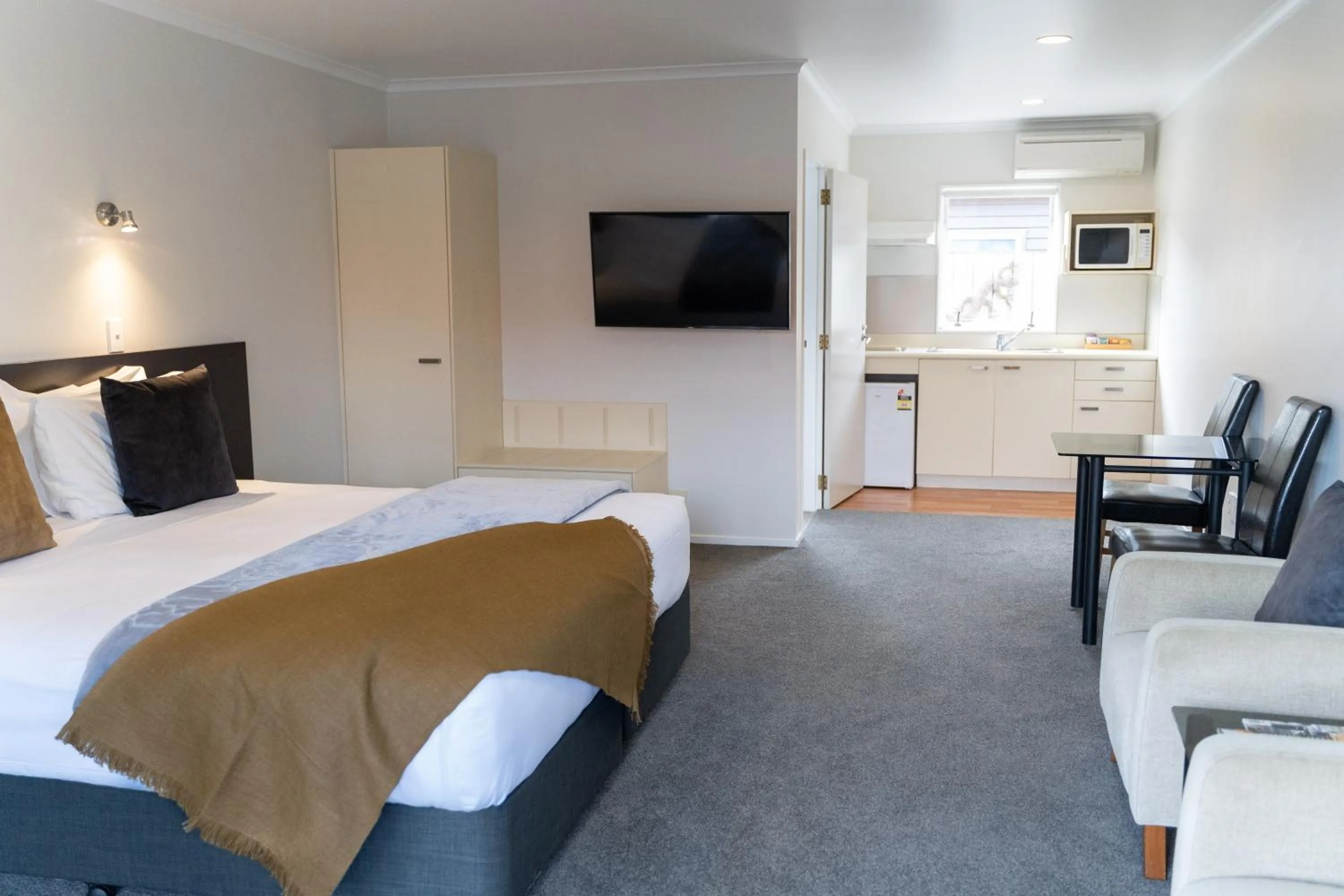 Bed in Pacific Coast Motor Lodge