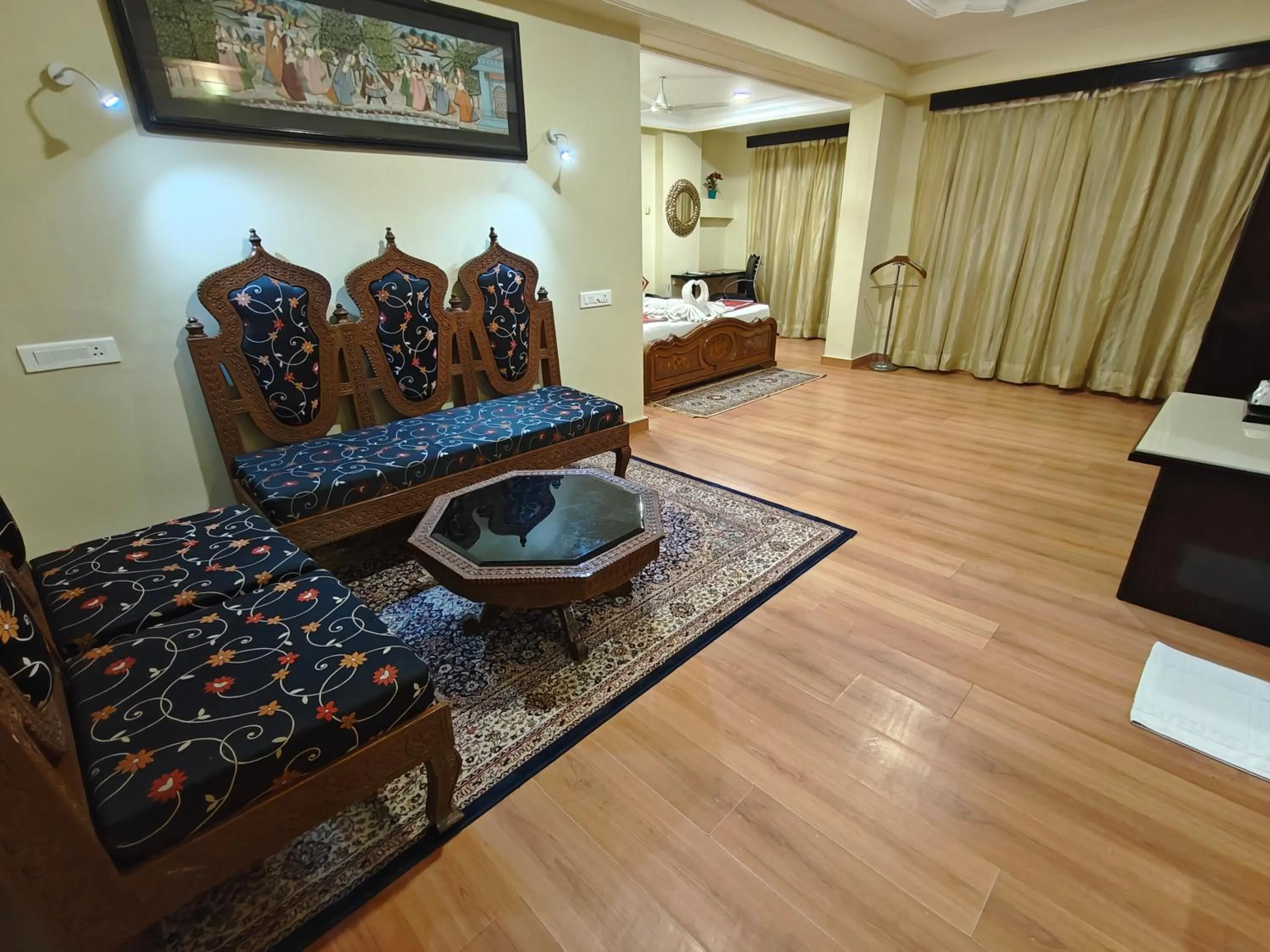 Seating area, Bed in Chandra Inn