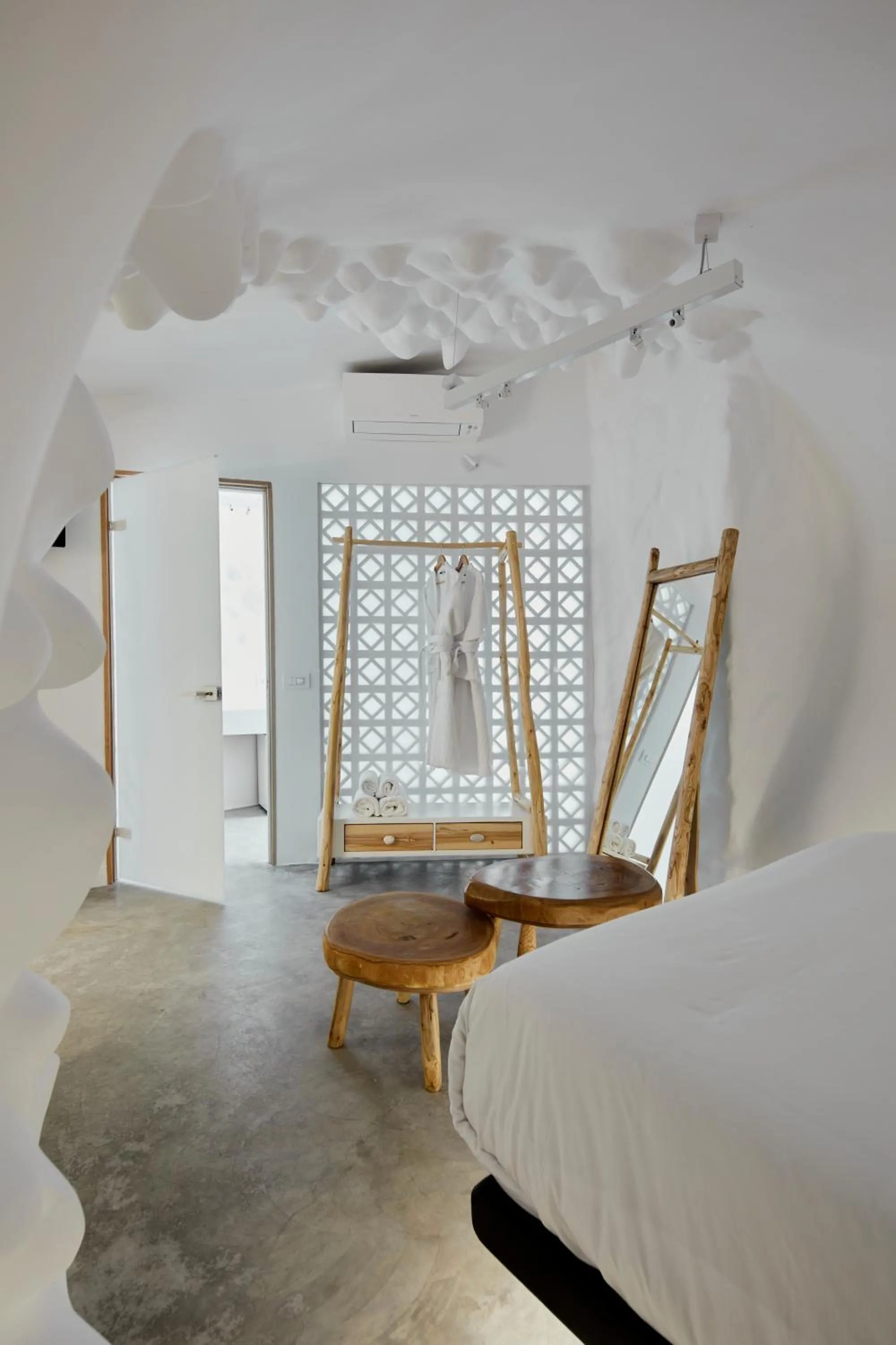 Bed in Theano Cave Suites & Villas