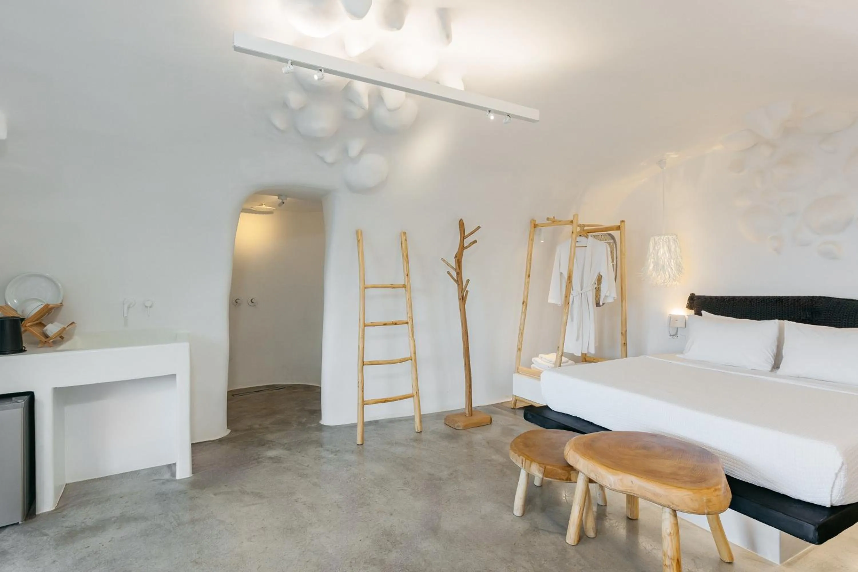 Bed in Theano Cave Suites & Villas