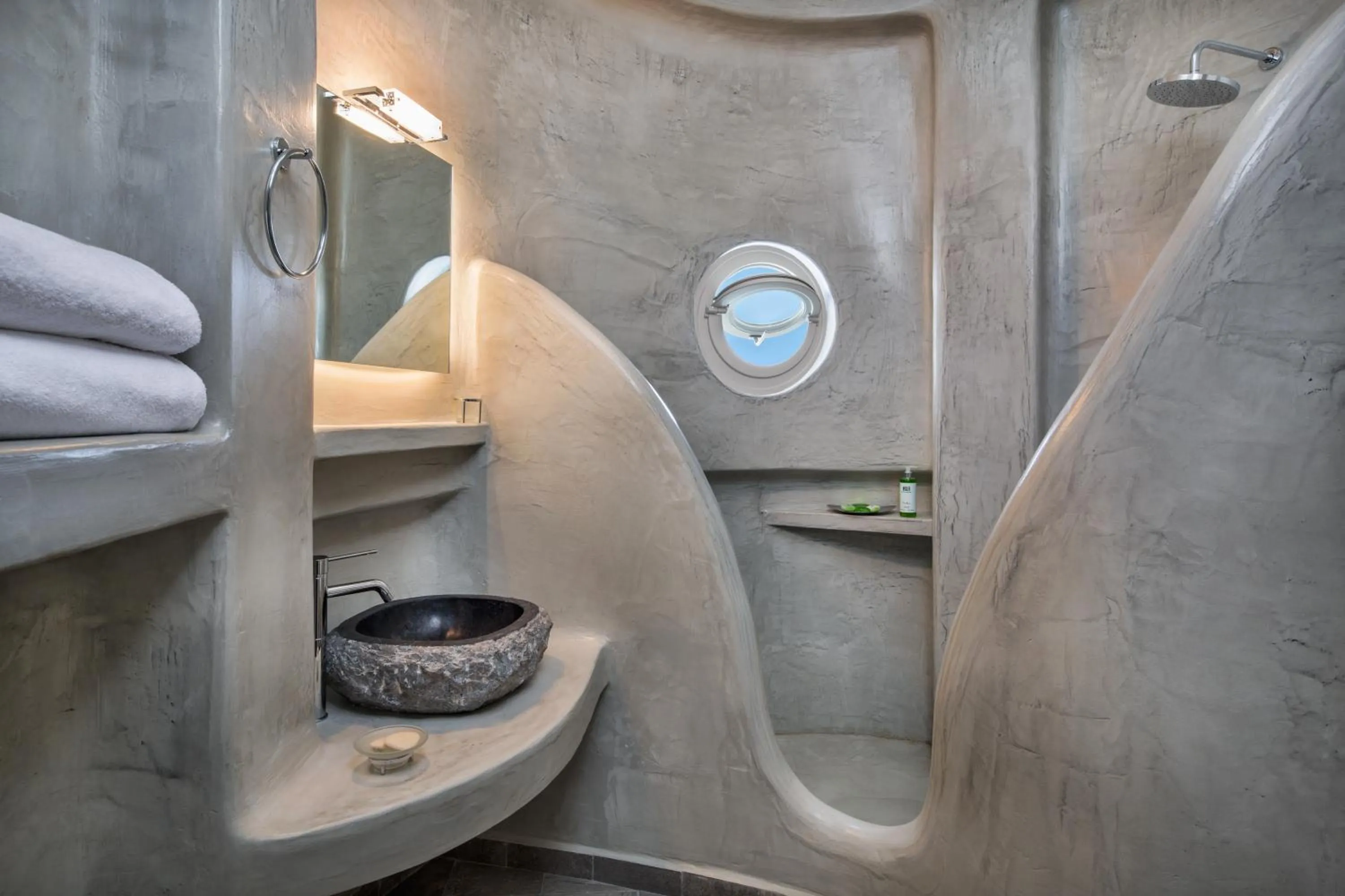 Bathroom in Theano Cave Suites & Villas