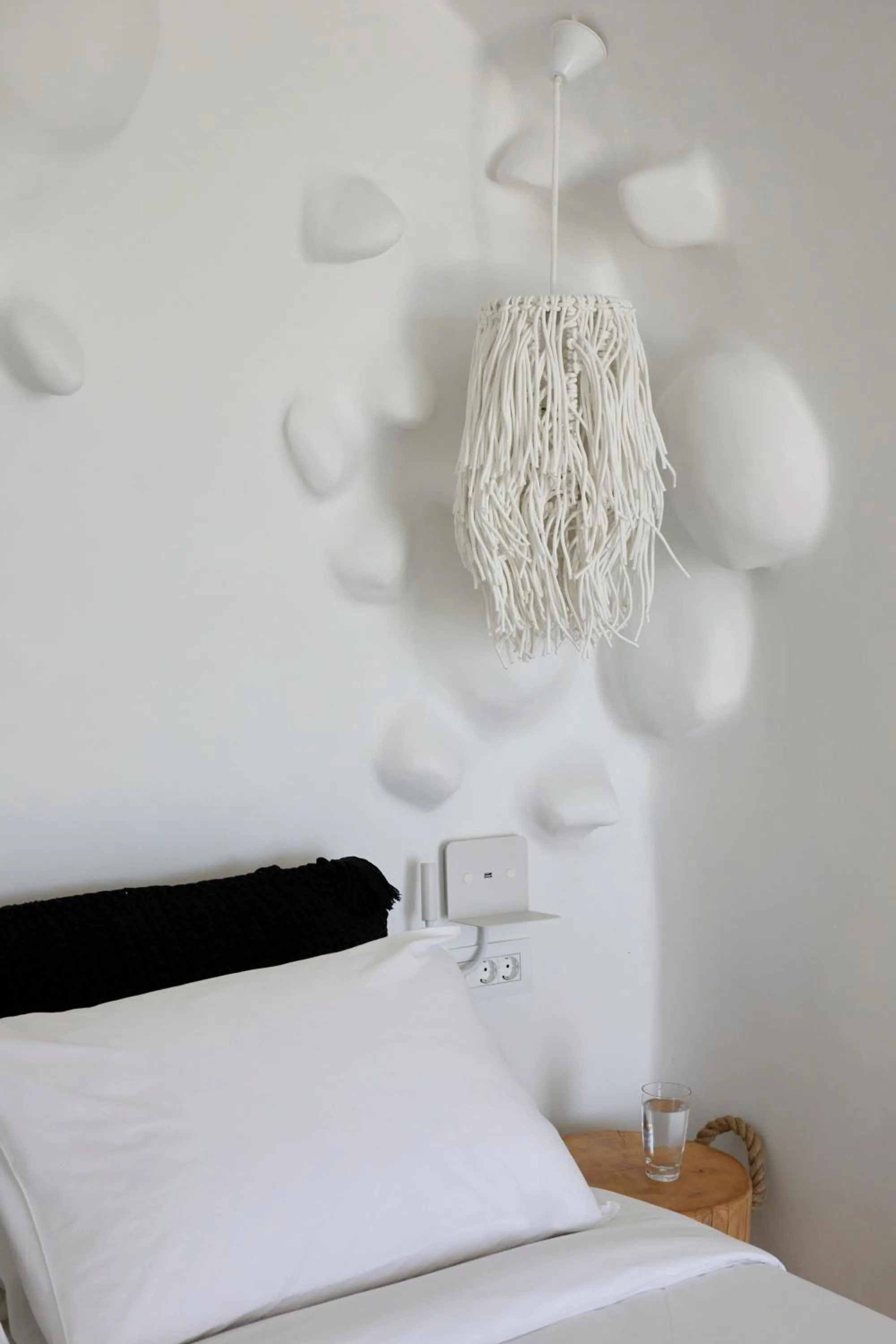 Bed in Theano Cave Suites & Villas