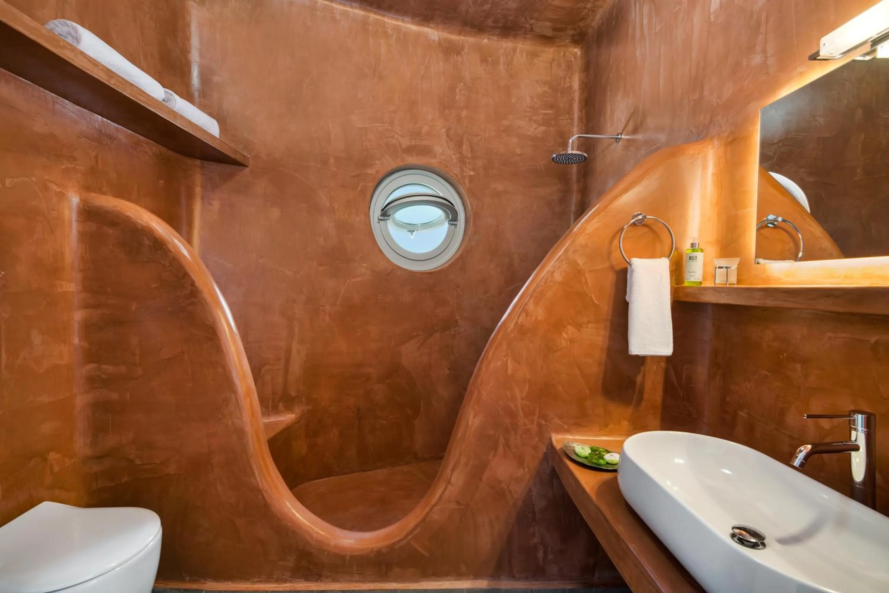 Bathroom in Theano Cave Suites & Villas