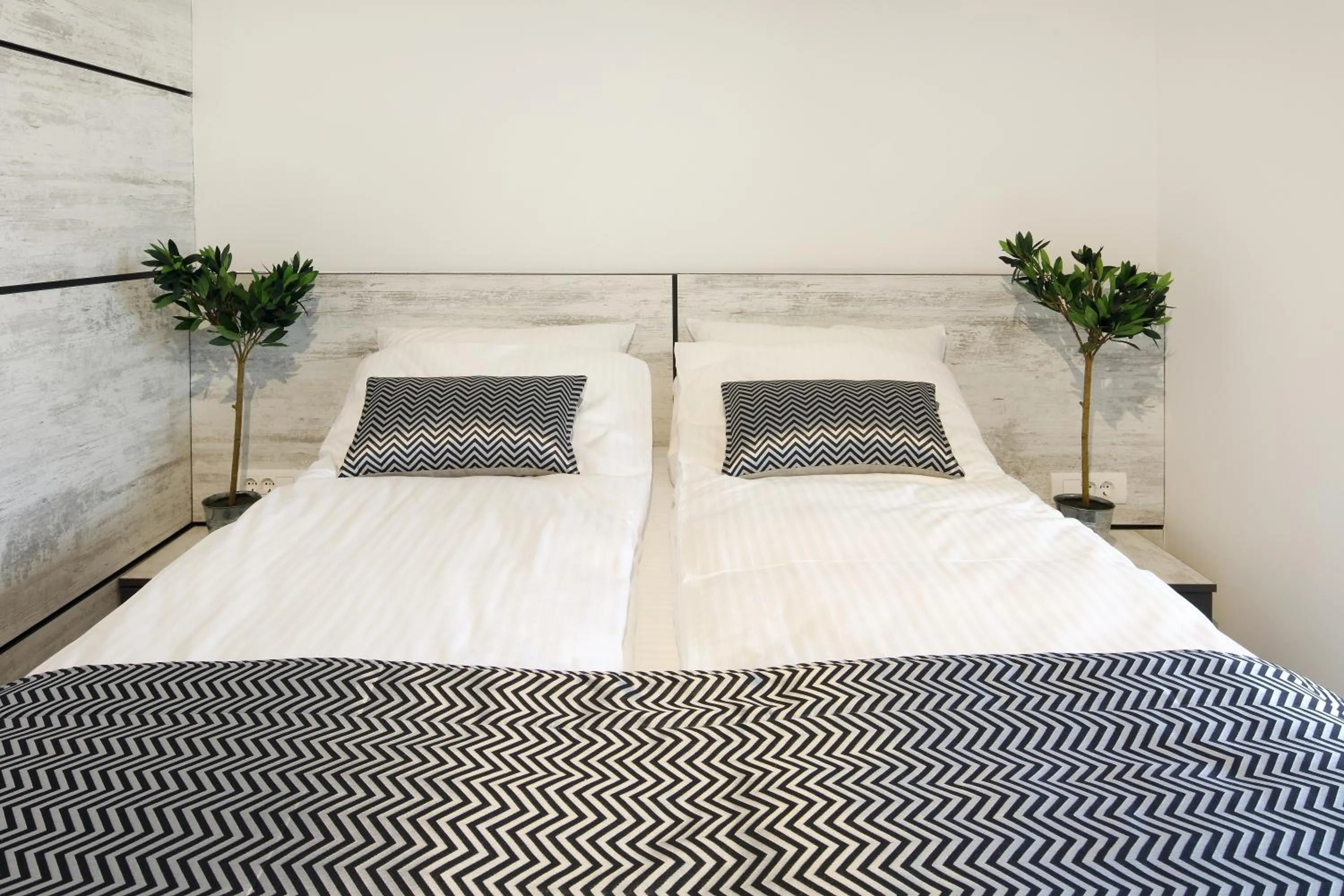 Bed in Hotel Koncept Residence