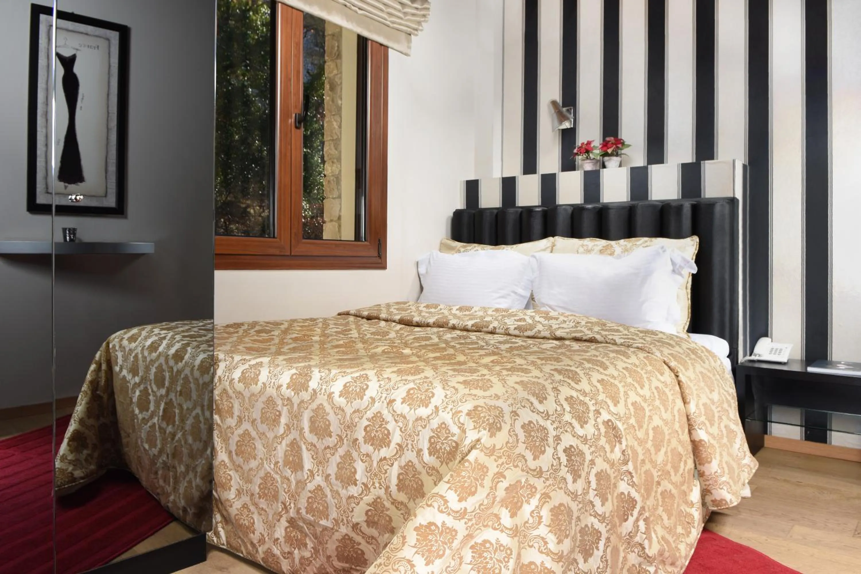 Bed in Forest Suites Boutique Hotel