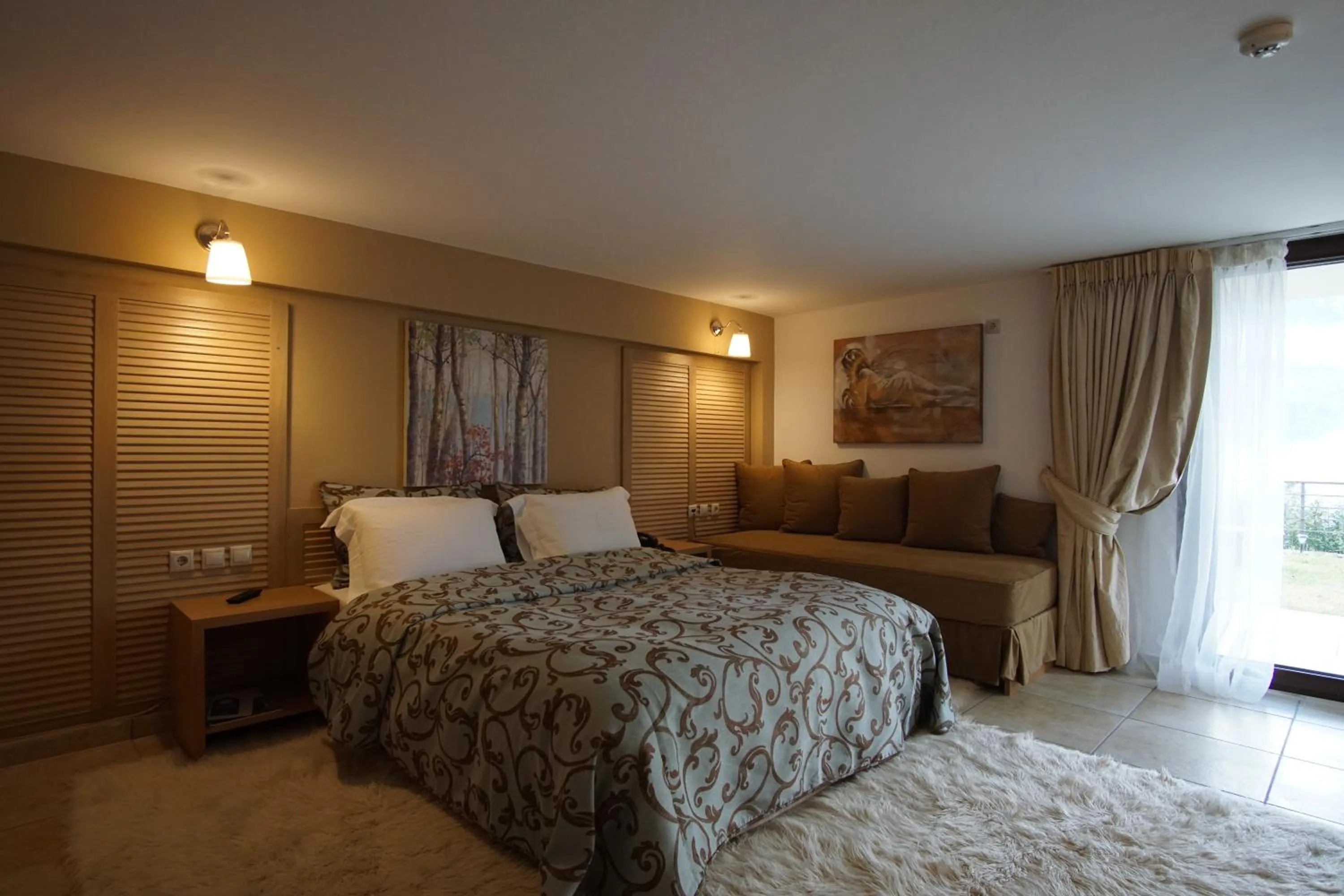 Bed in Forest Suites Boutique Hotel