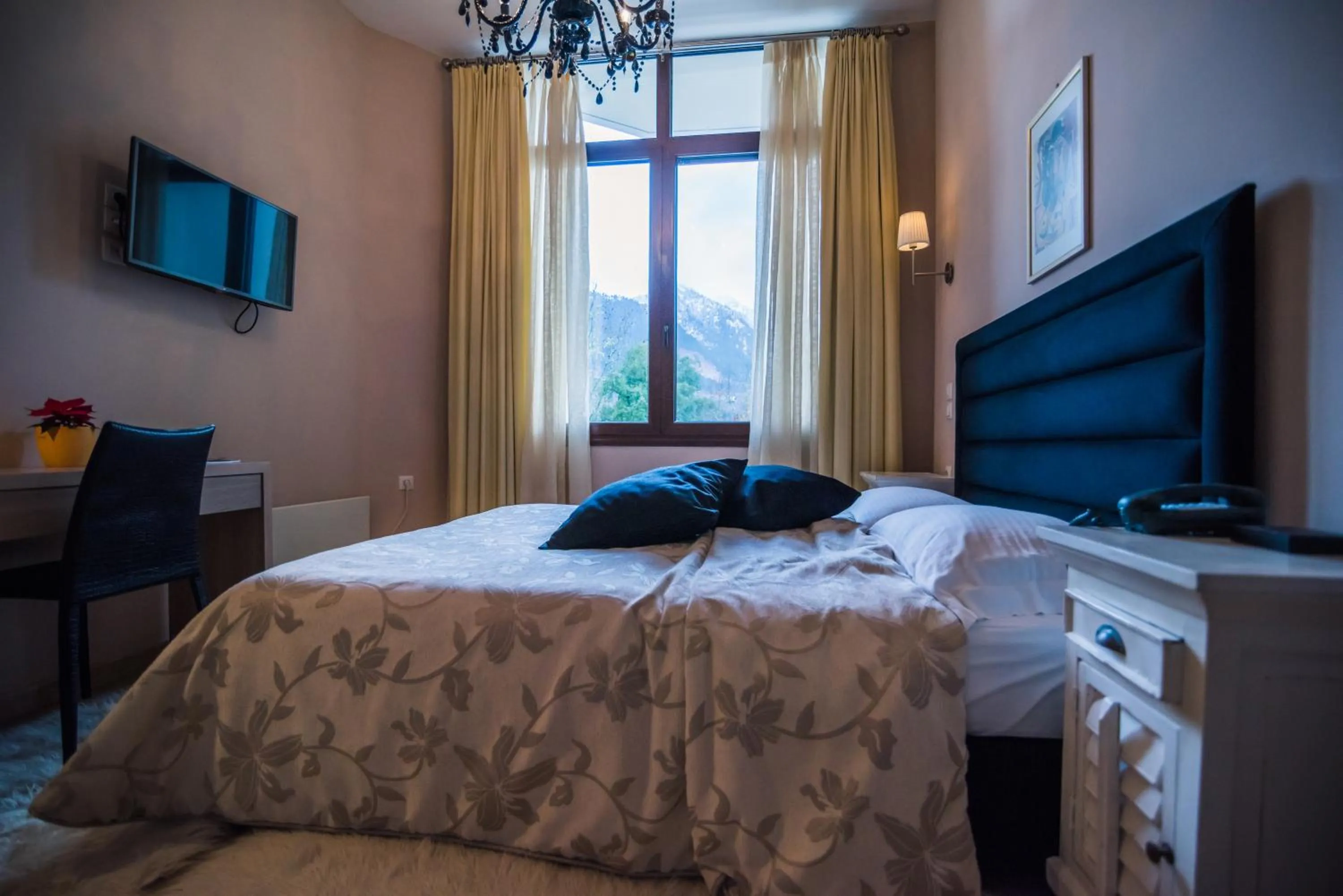 Bed in Forest Suites Boutique Hotel