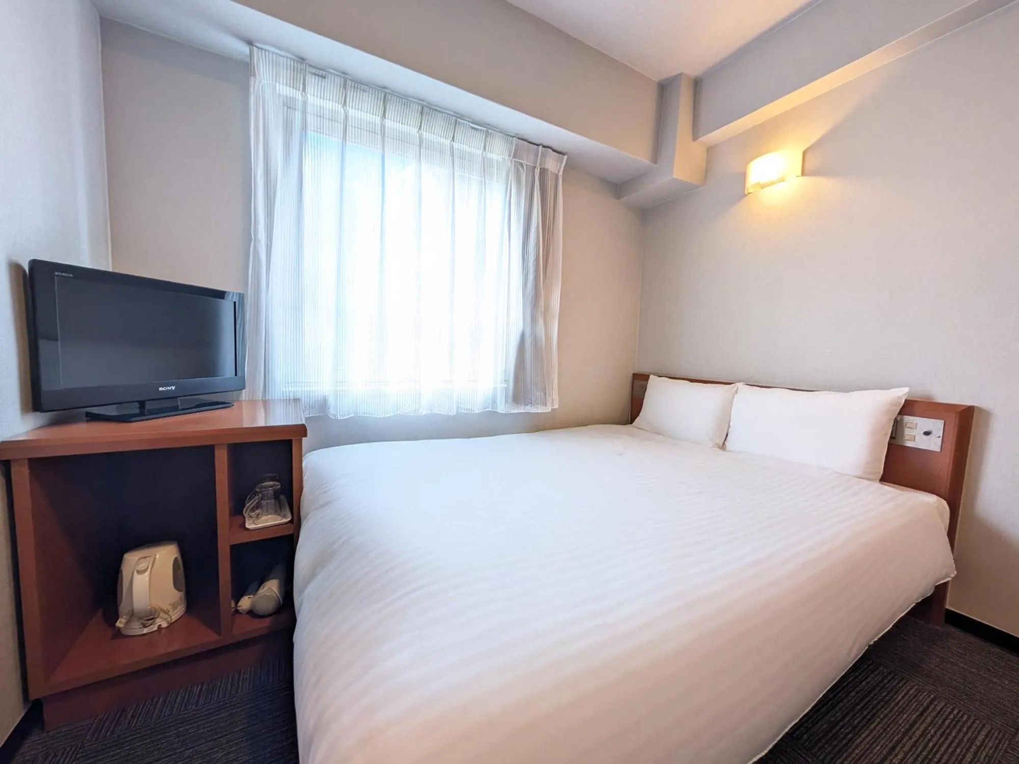 Photo of the whole room, Bed in GR Hotel Ginzadori