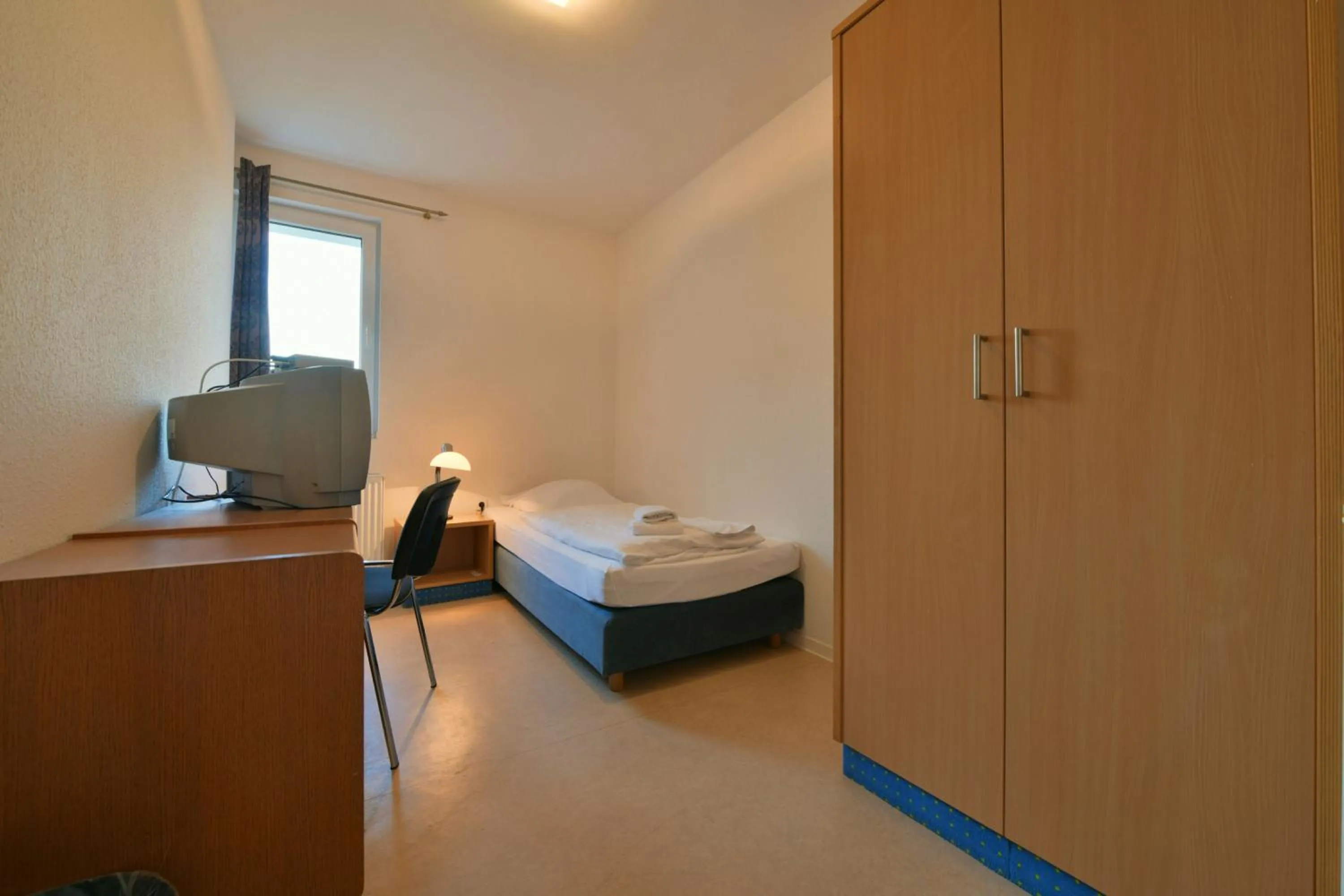 Photo of the whole room, Bed in SKYAPPART Merseburg