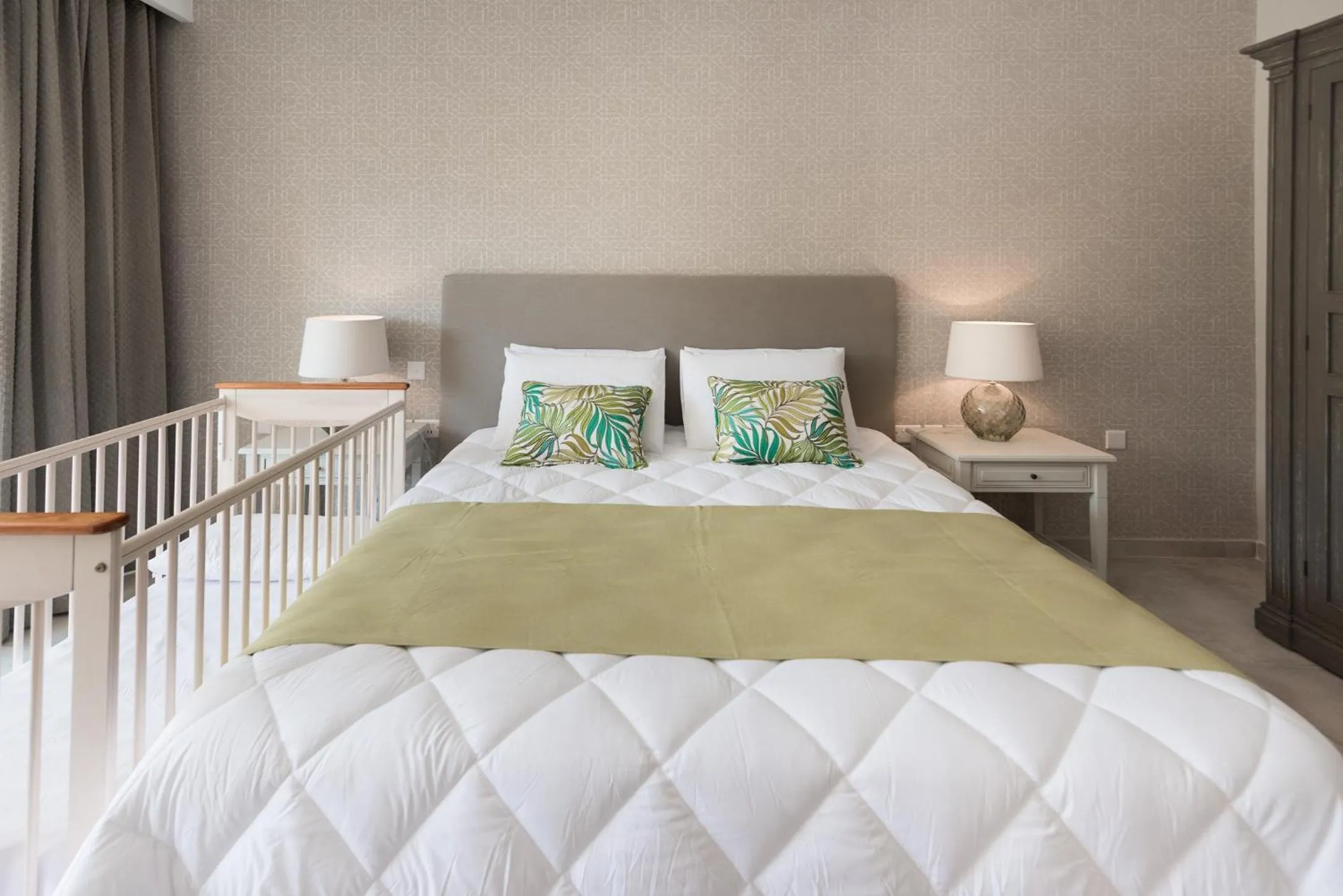 Bed in Cesca's Boutique Hotel