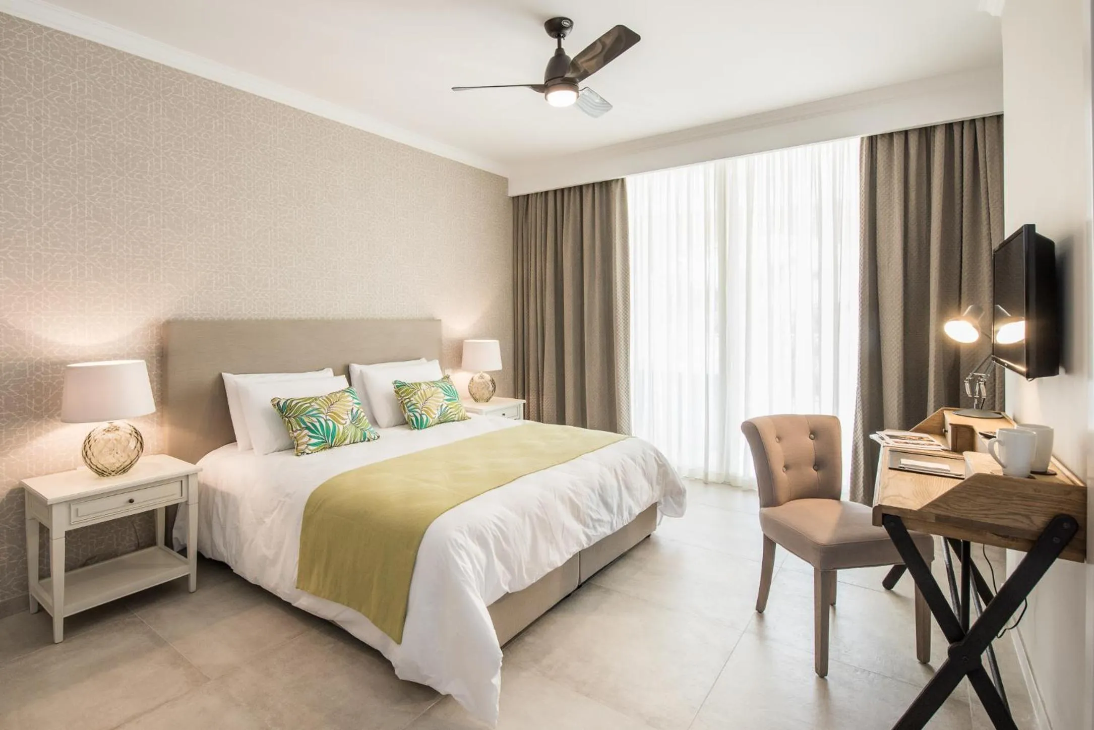 Bed in Cesca's Boutique Hotel