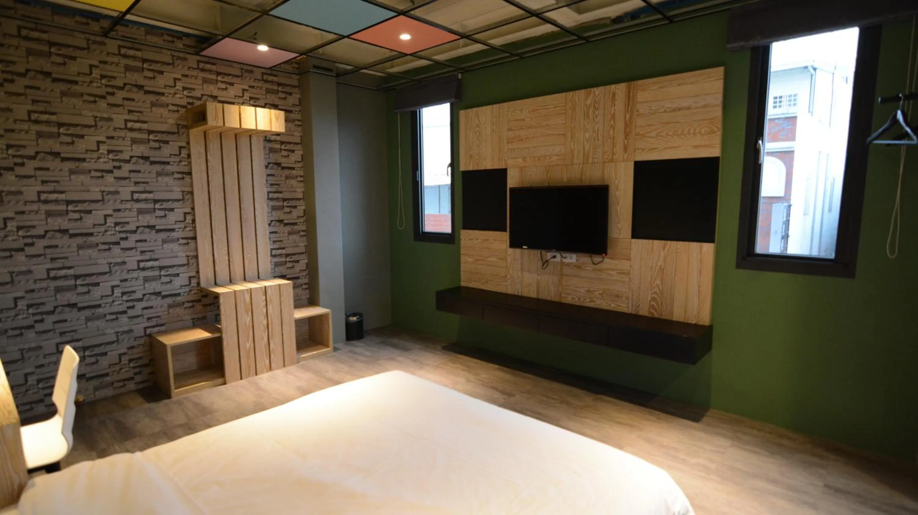 Communal lounge/ TV room, Bed in Chi Chu B&B