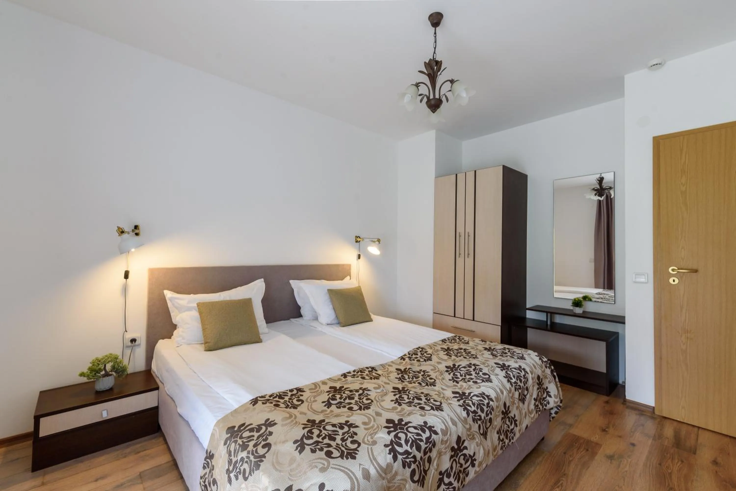 Bed in Grand Royale Apartment Complex & Spa