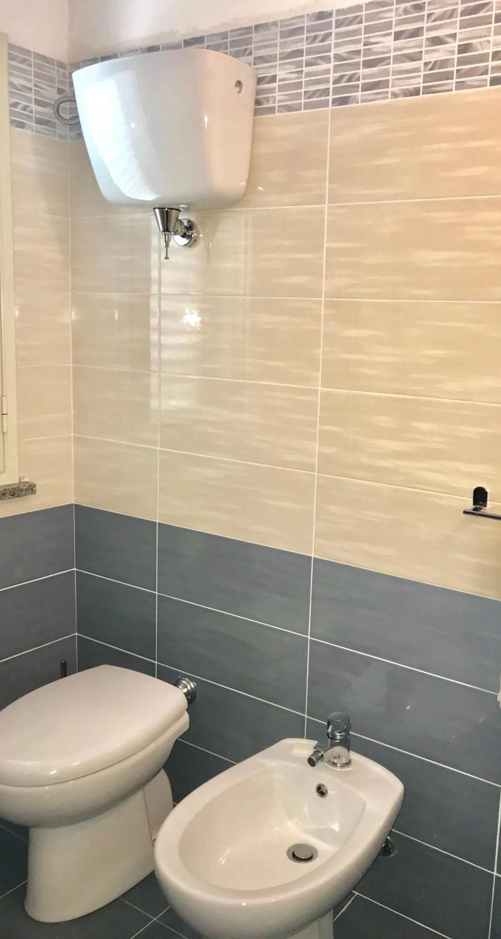 Toilet in A Turri Rooms and Restaurant