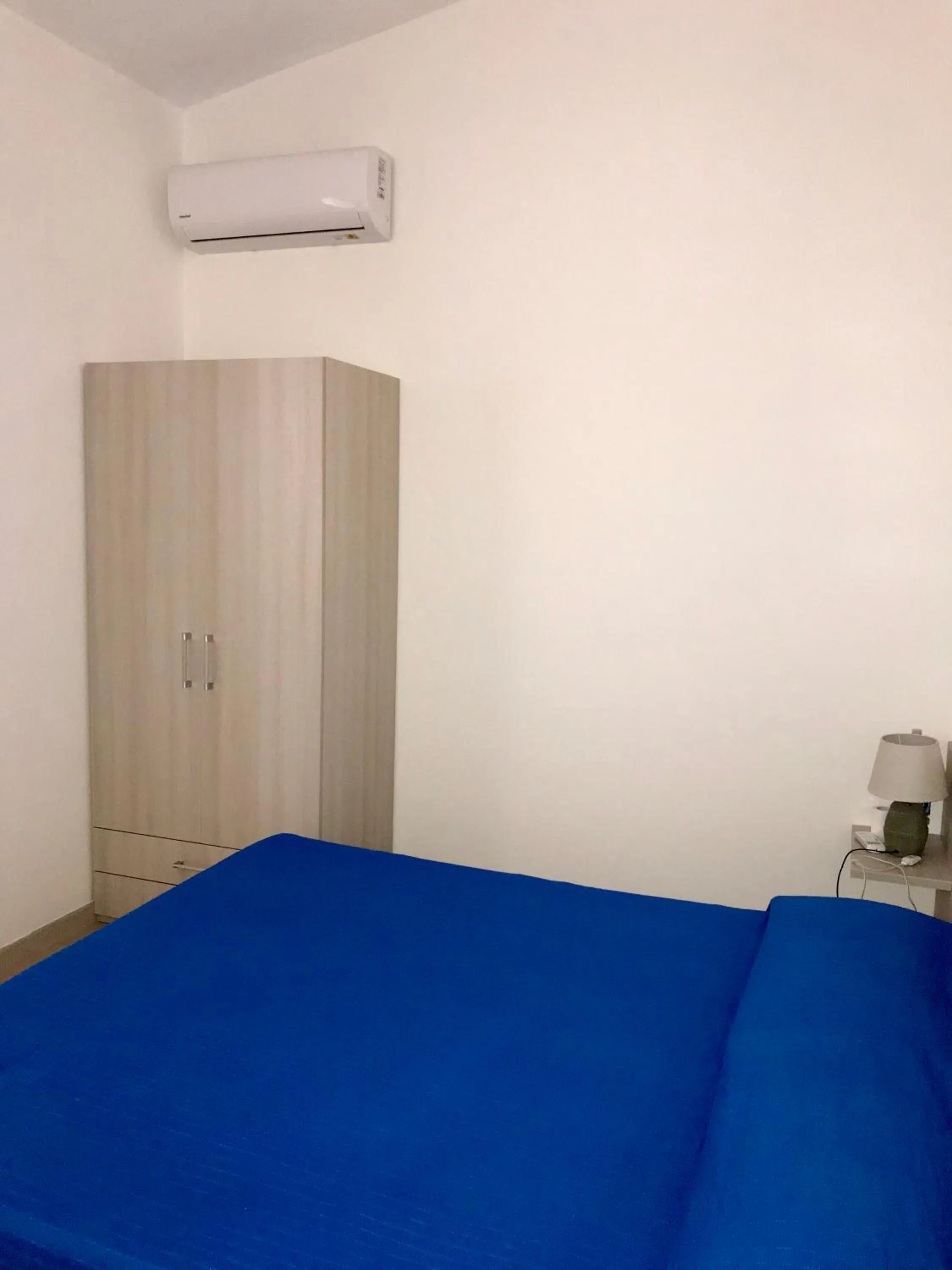 Bed in A Turri Rooms and Restaurant