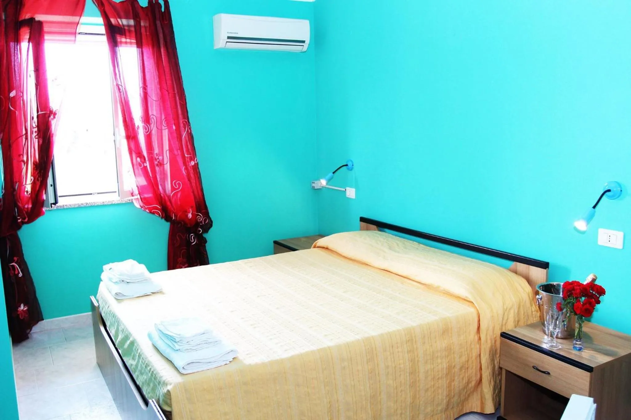 Bed in A Turri Rooms and Restaurant