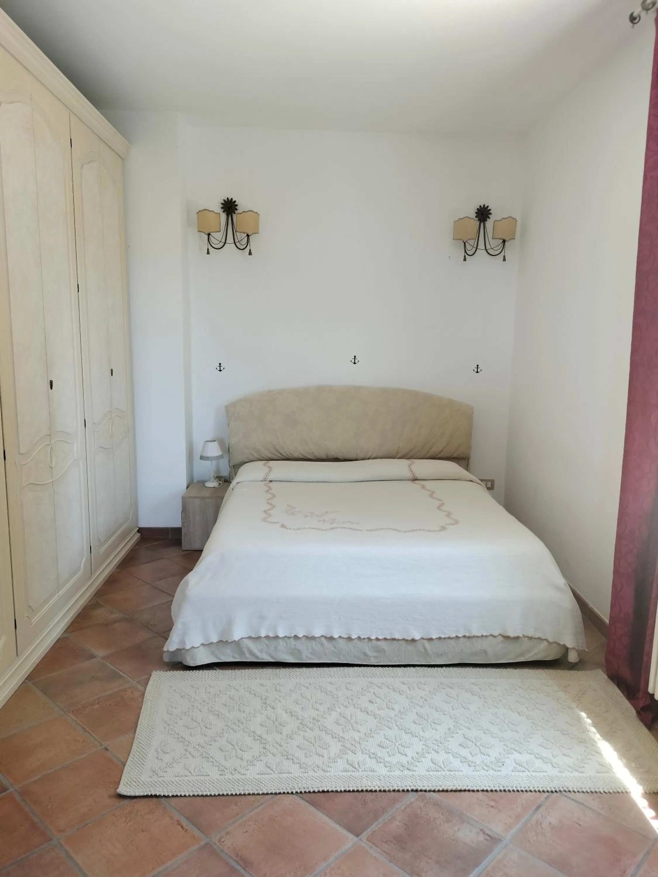 Bed in A Turri Rooms and Restaurant