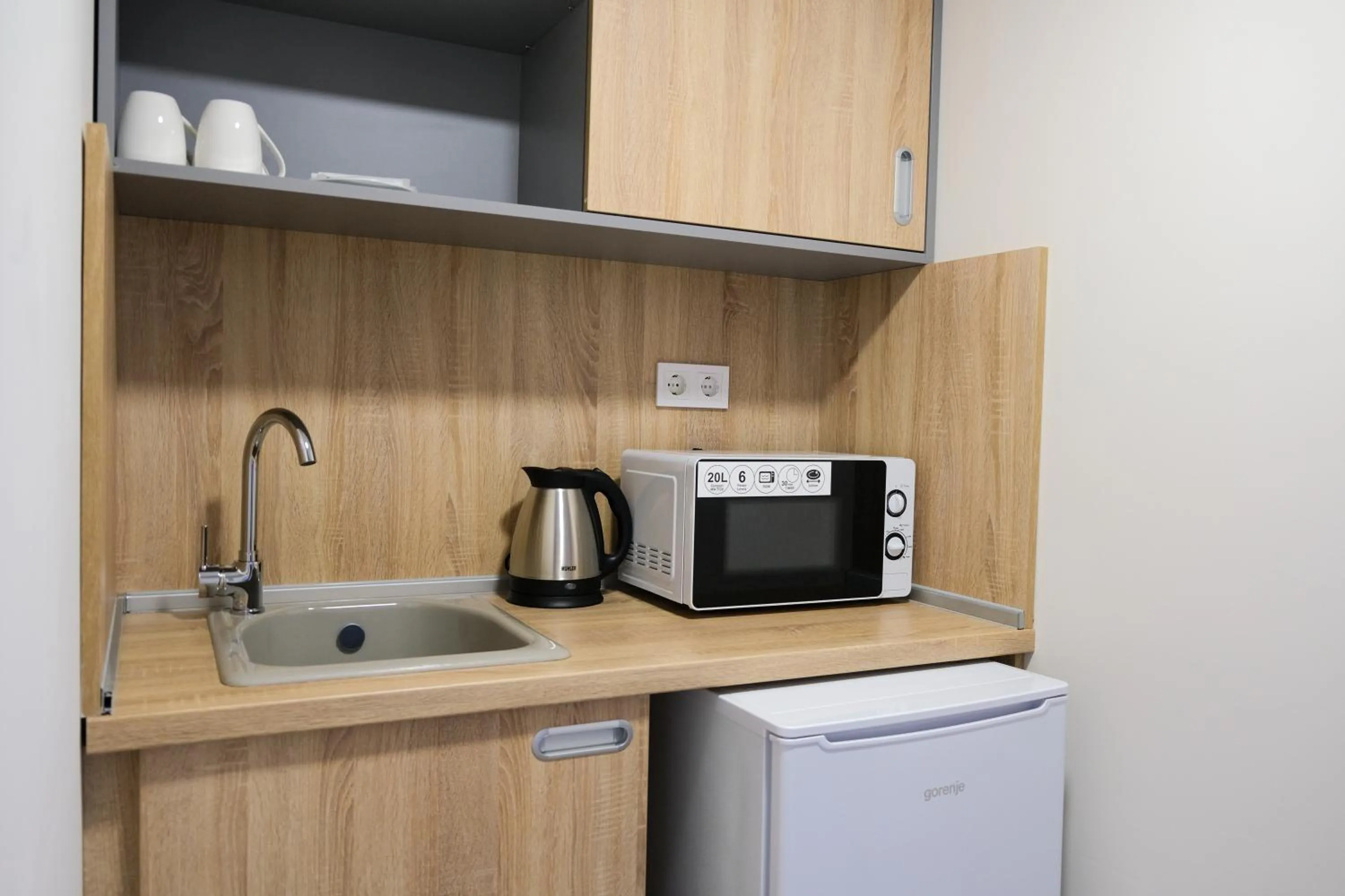 Kitchen or kitchenette in SPS Hotel