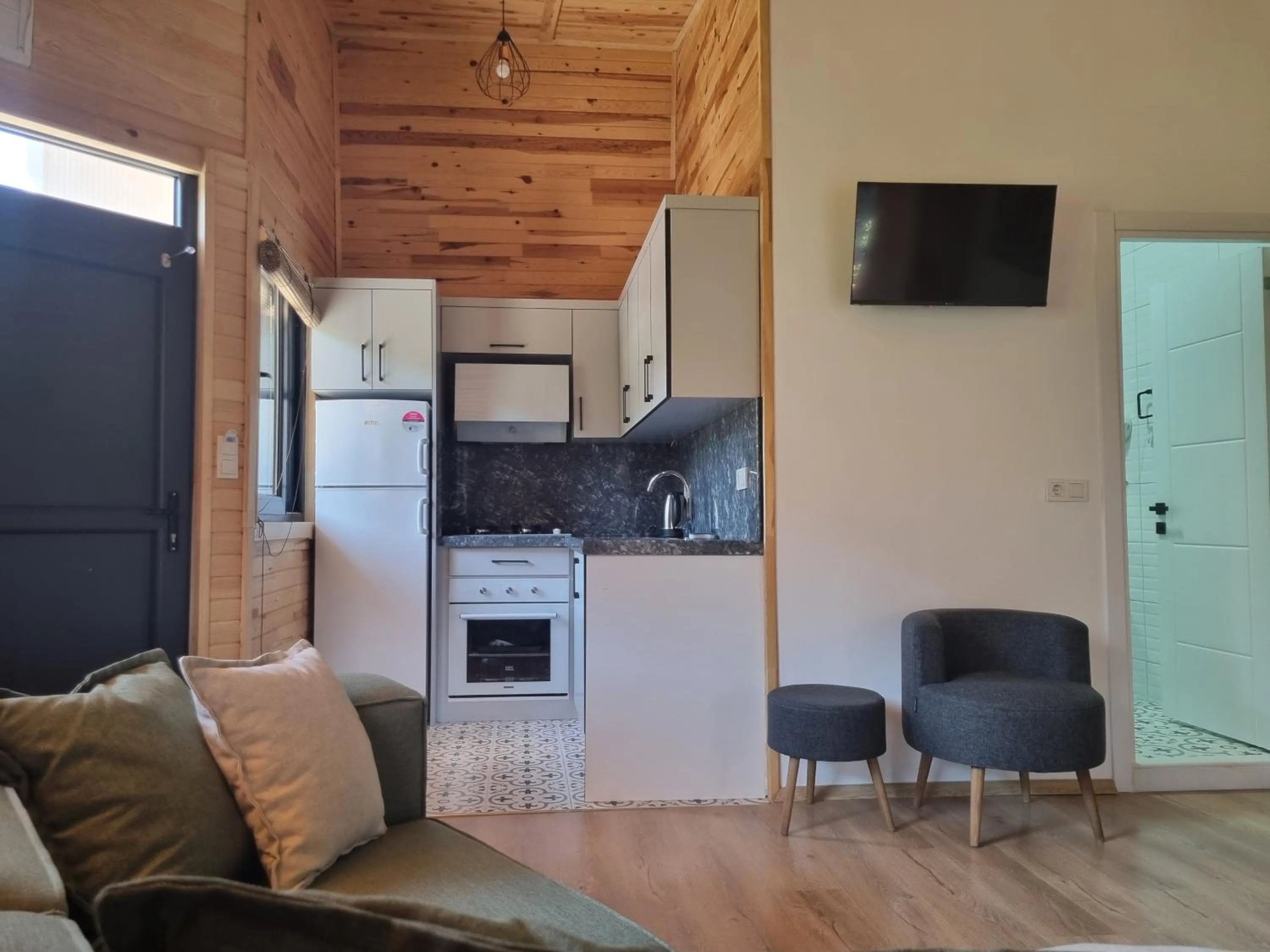 Kitchen or kitchenette in Sunset Boutique Hotel & Apartments