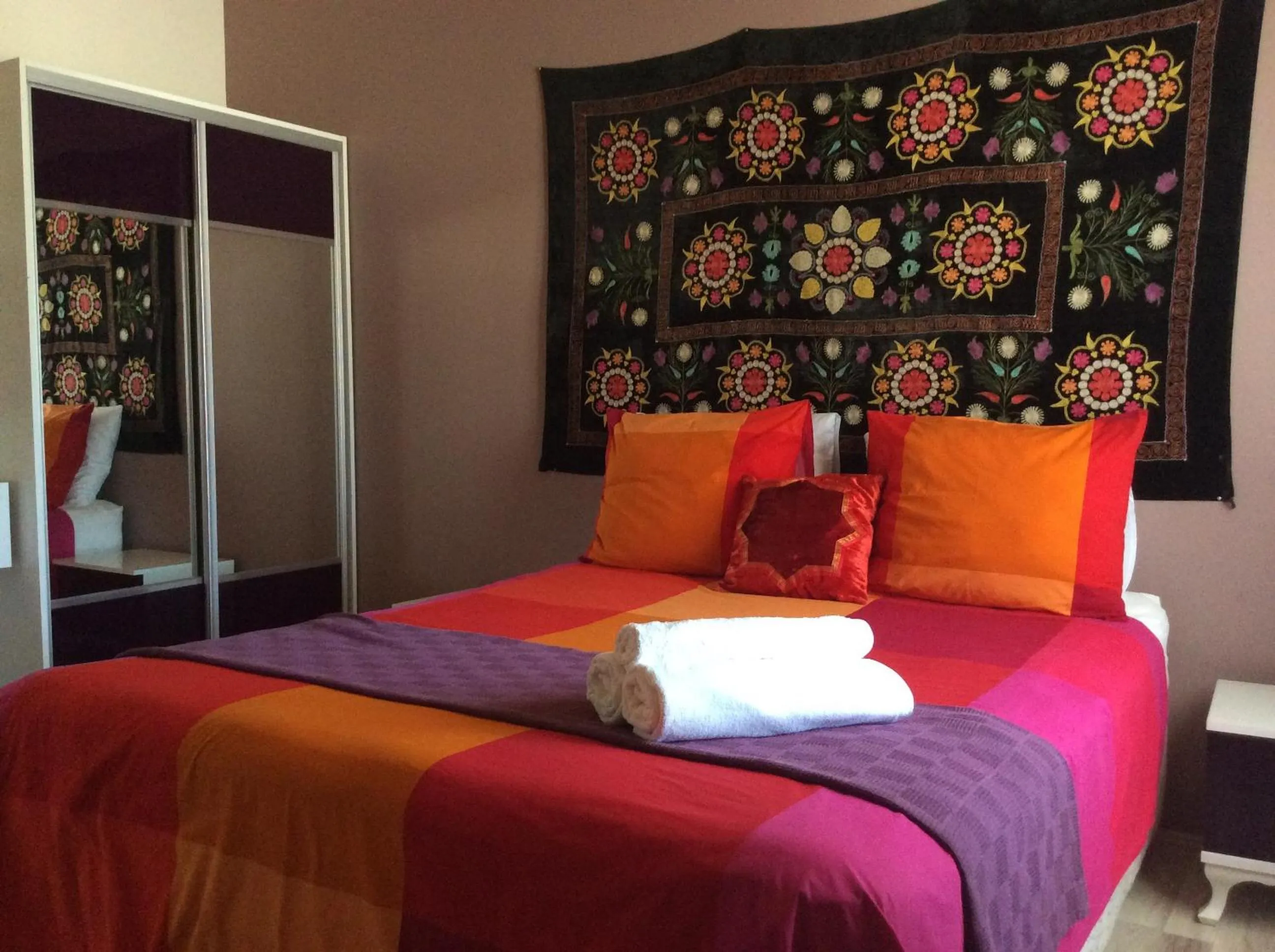 Bed in Sunset Boutique Hotel & Apartments