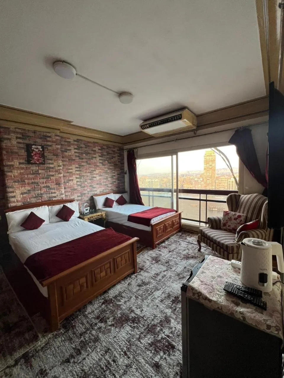 Living room, Bed in Nile Star Suites &Apartment