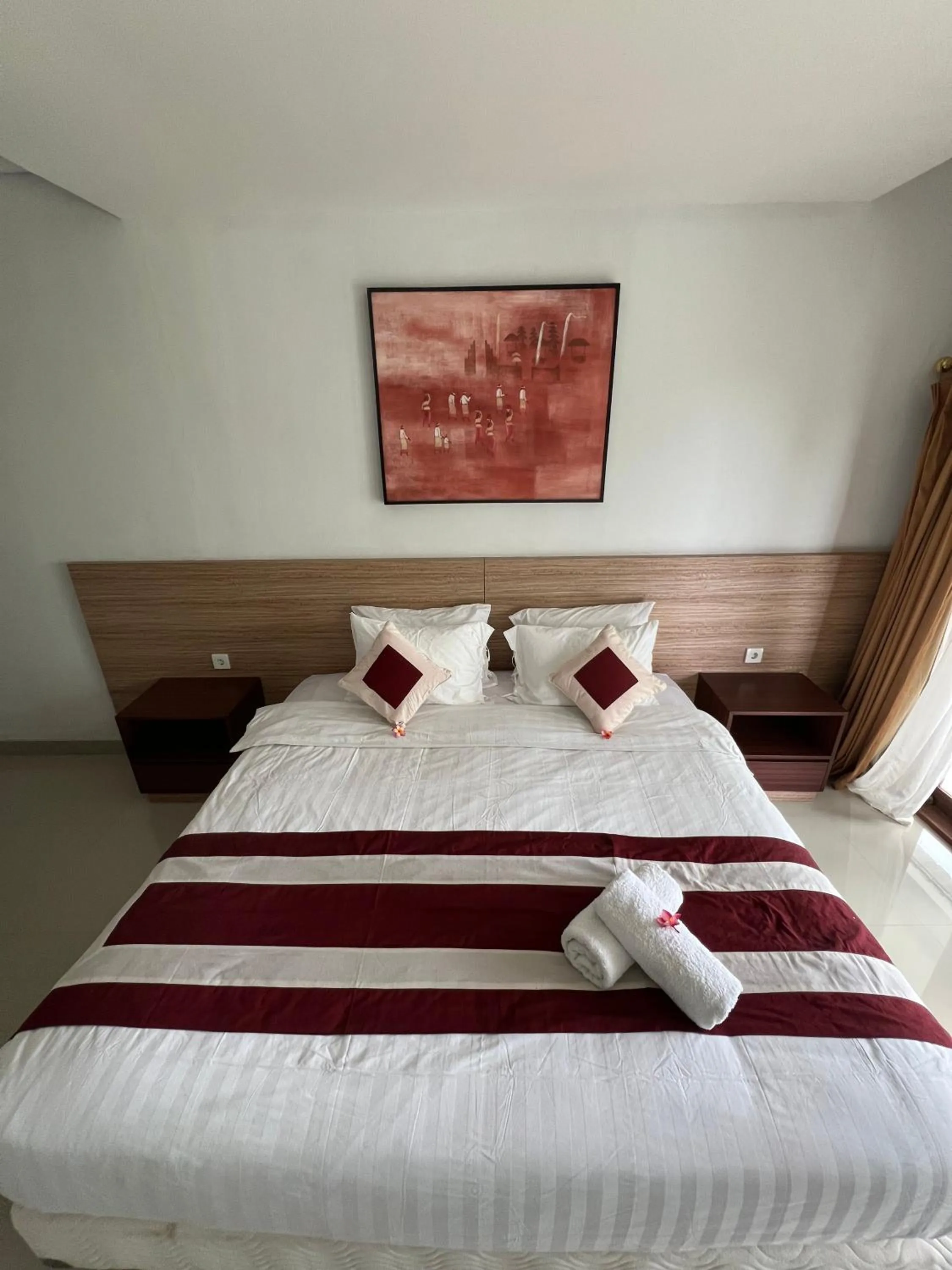 Bed in Mandhasativa Homestay