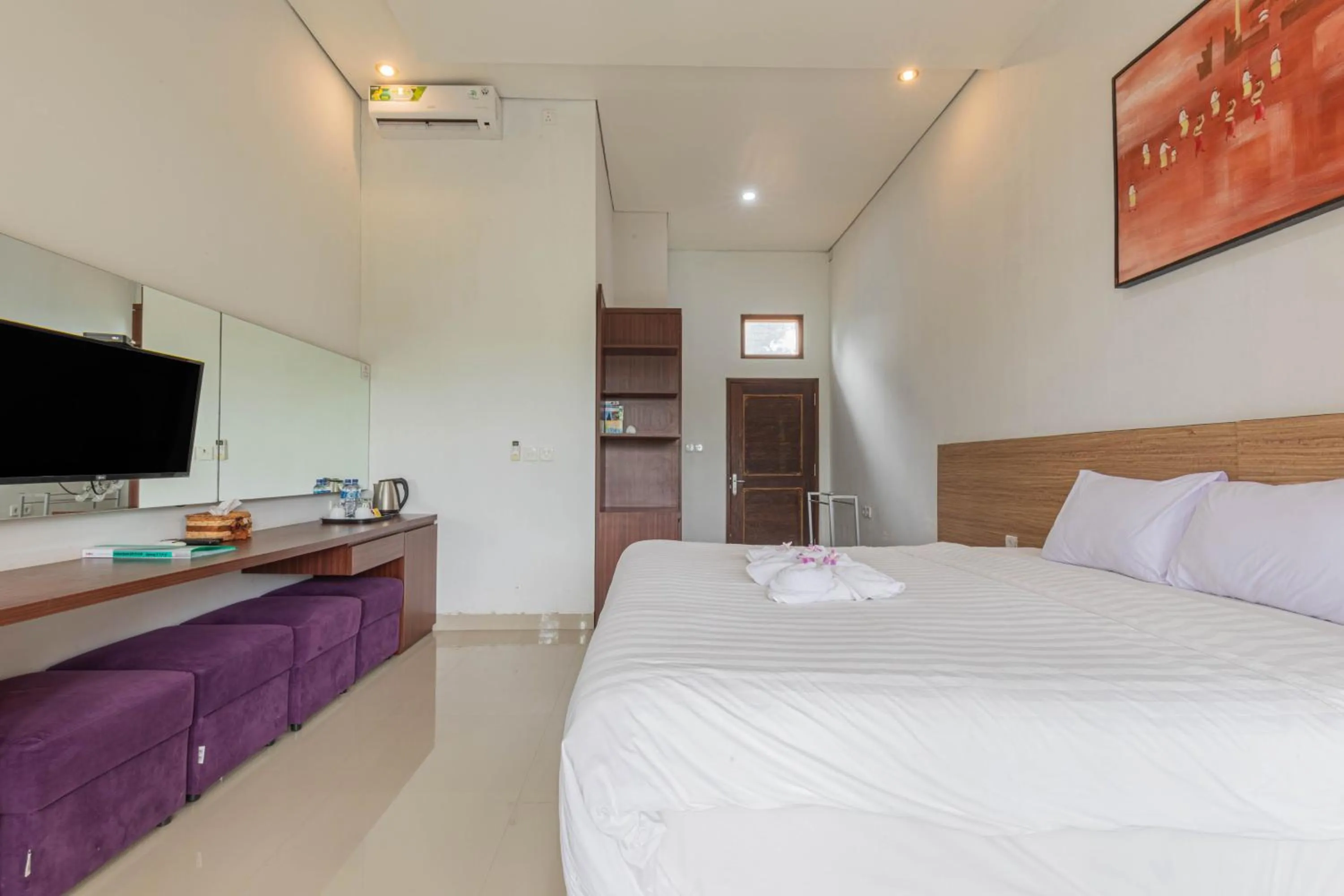 Bed in Mandhasativa Homestay