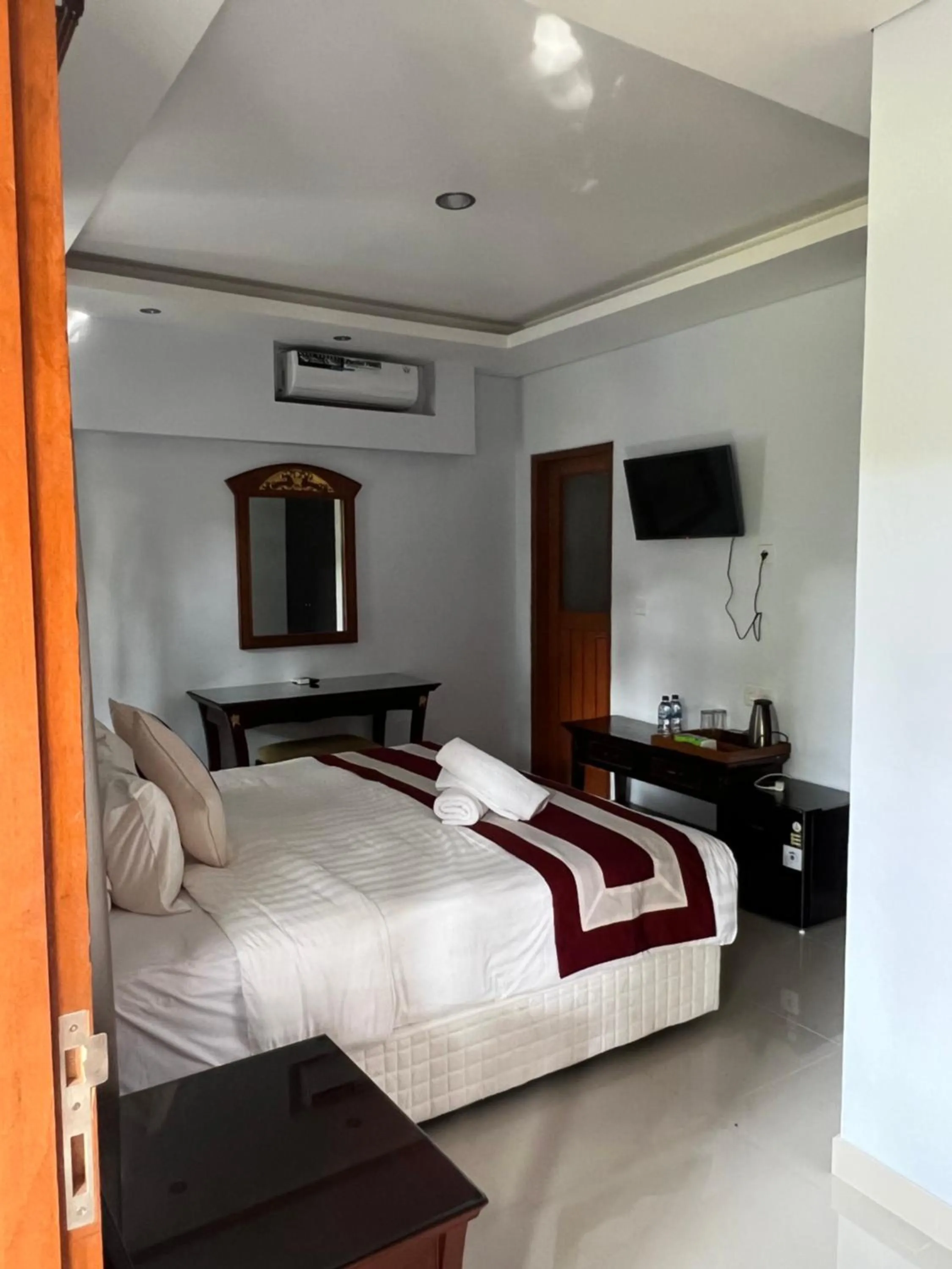 Bed in Mandhasativa Homestay