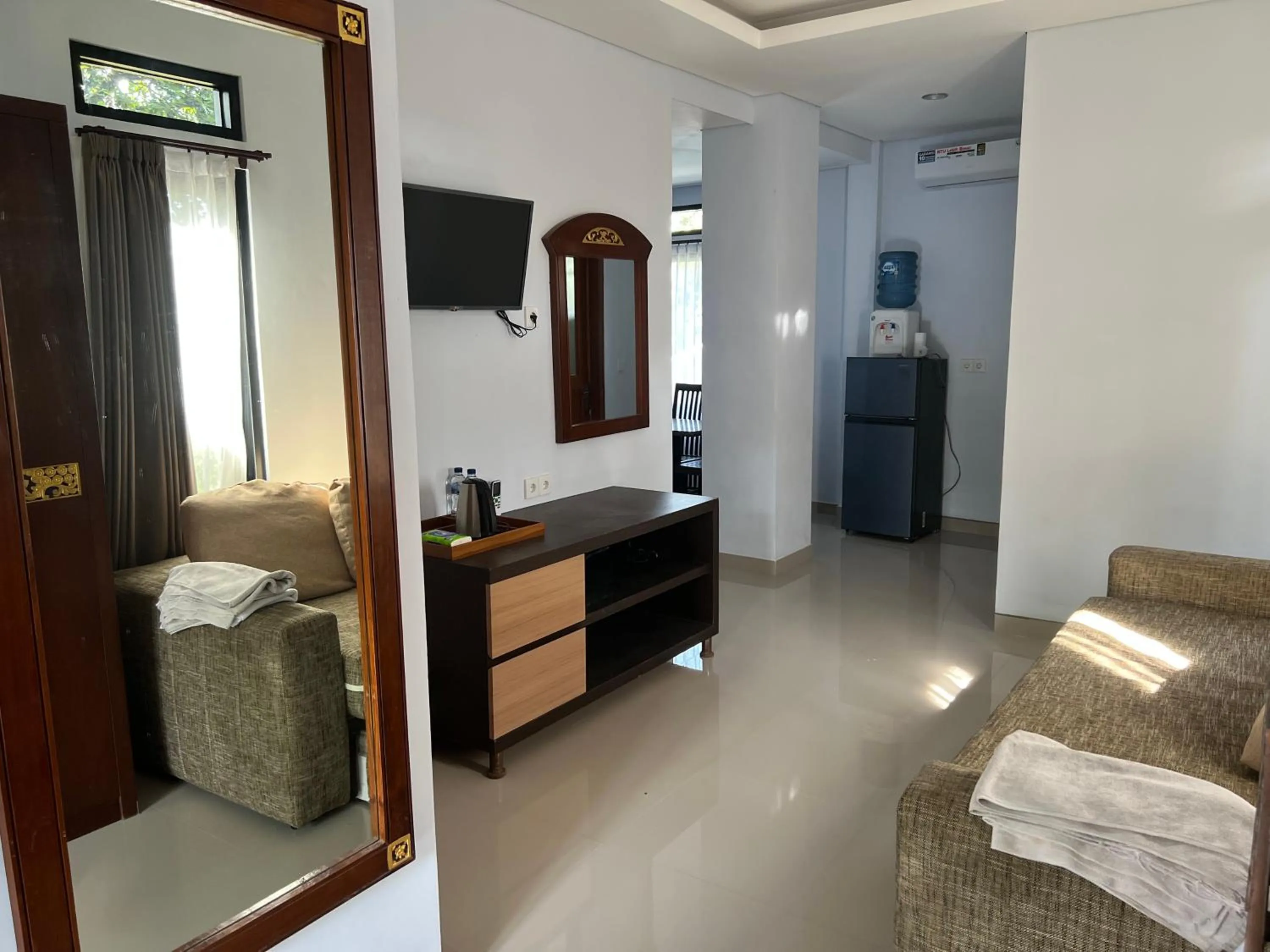 Bed in Mandhasativa Homestay