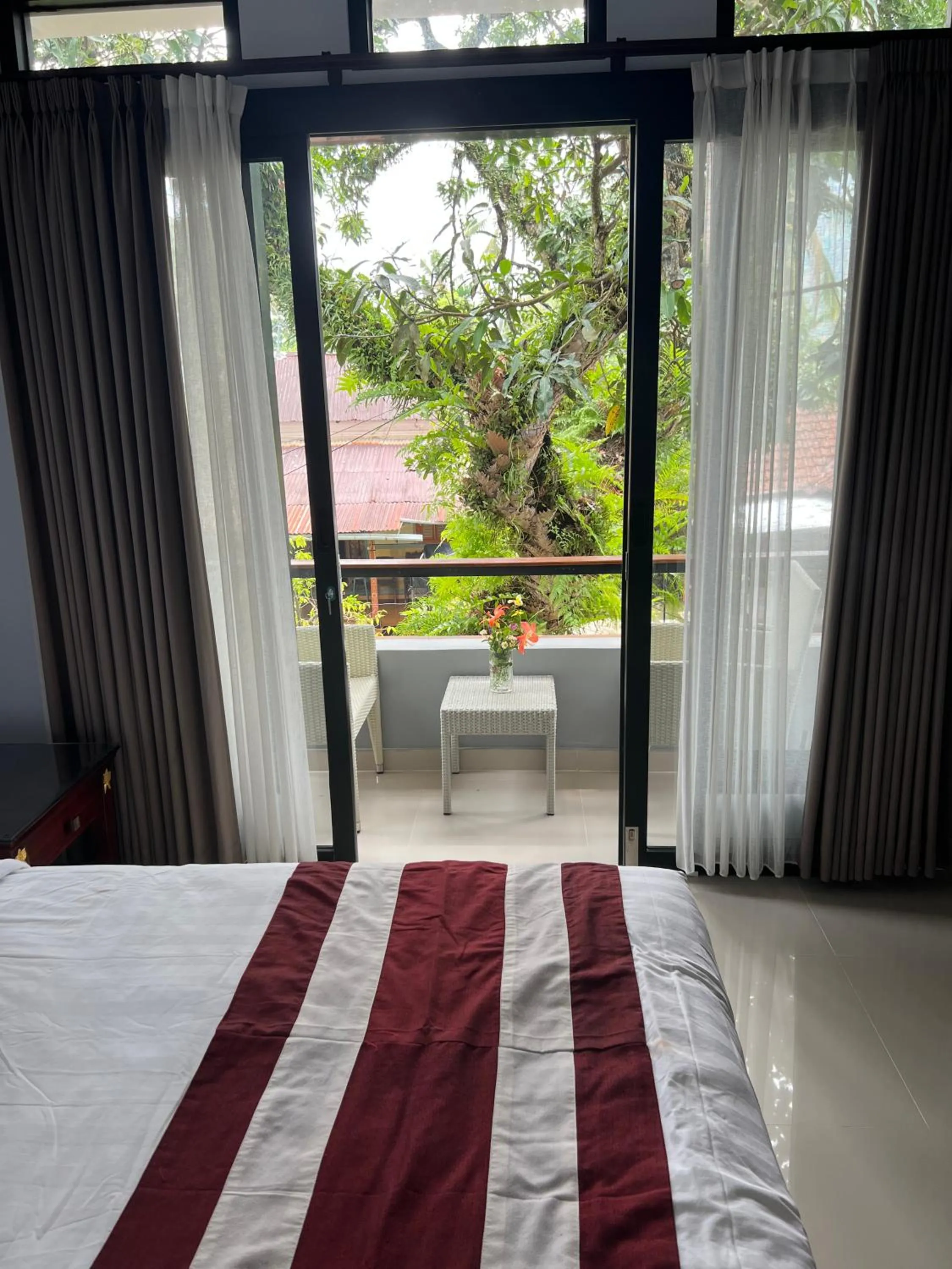 Bed in Mandhasativa Homestay