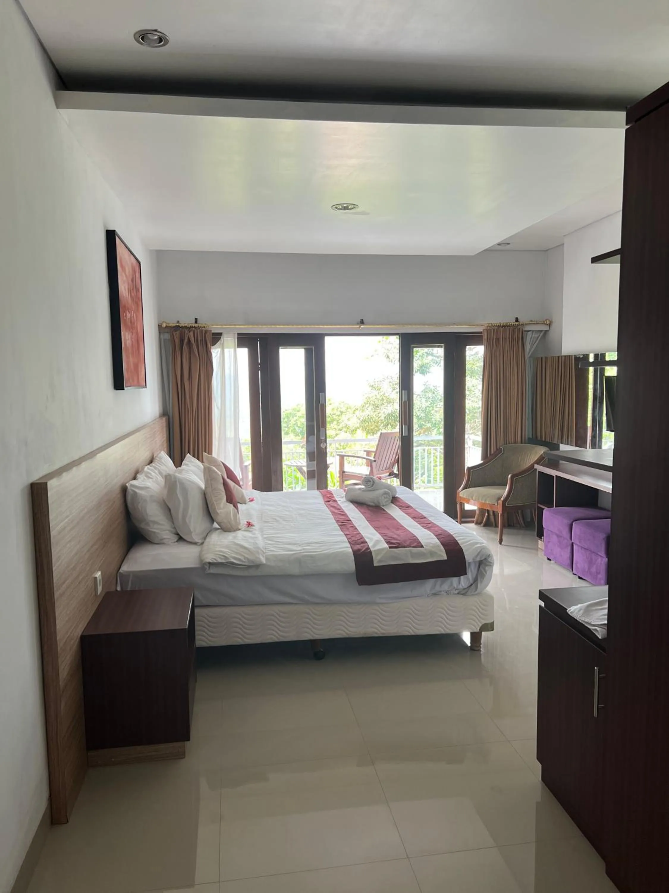 Bed in Mandhasativa Homestay