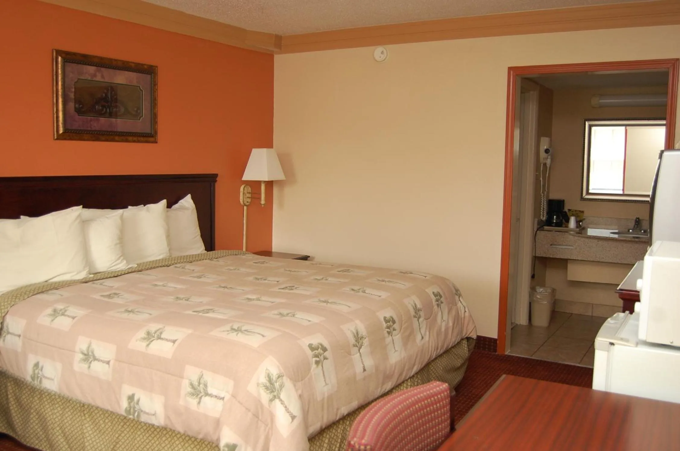 Bed in Executive Inn and Suites Springdale