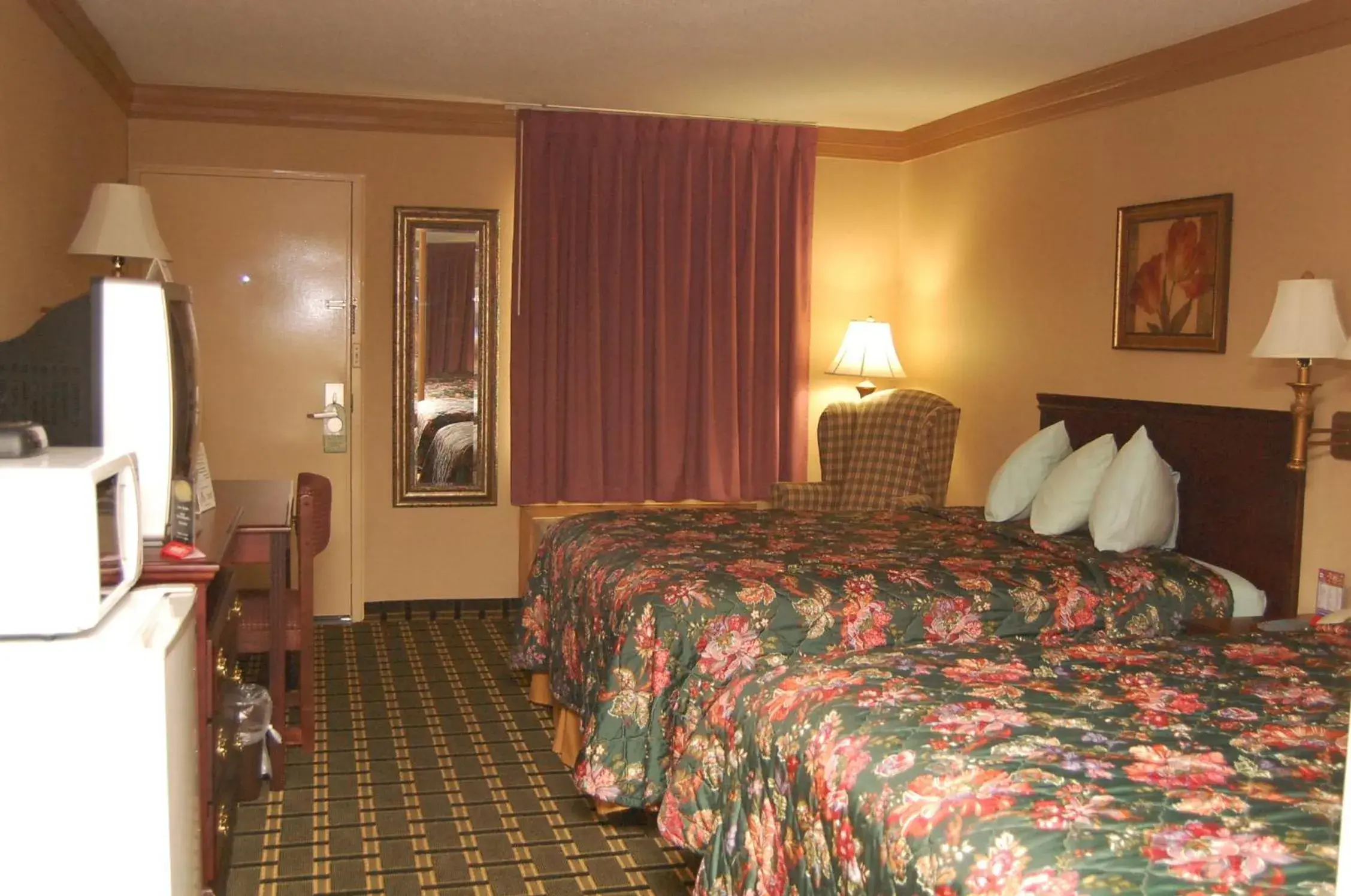 Bed in Executive Inn and Suites Springdale