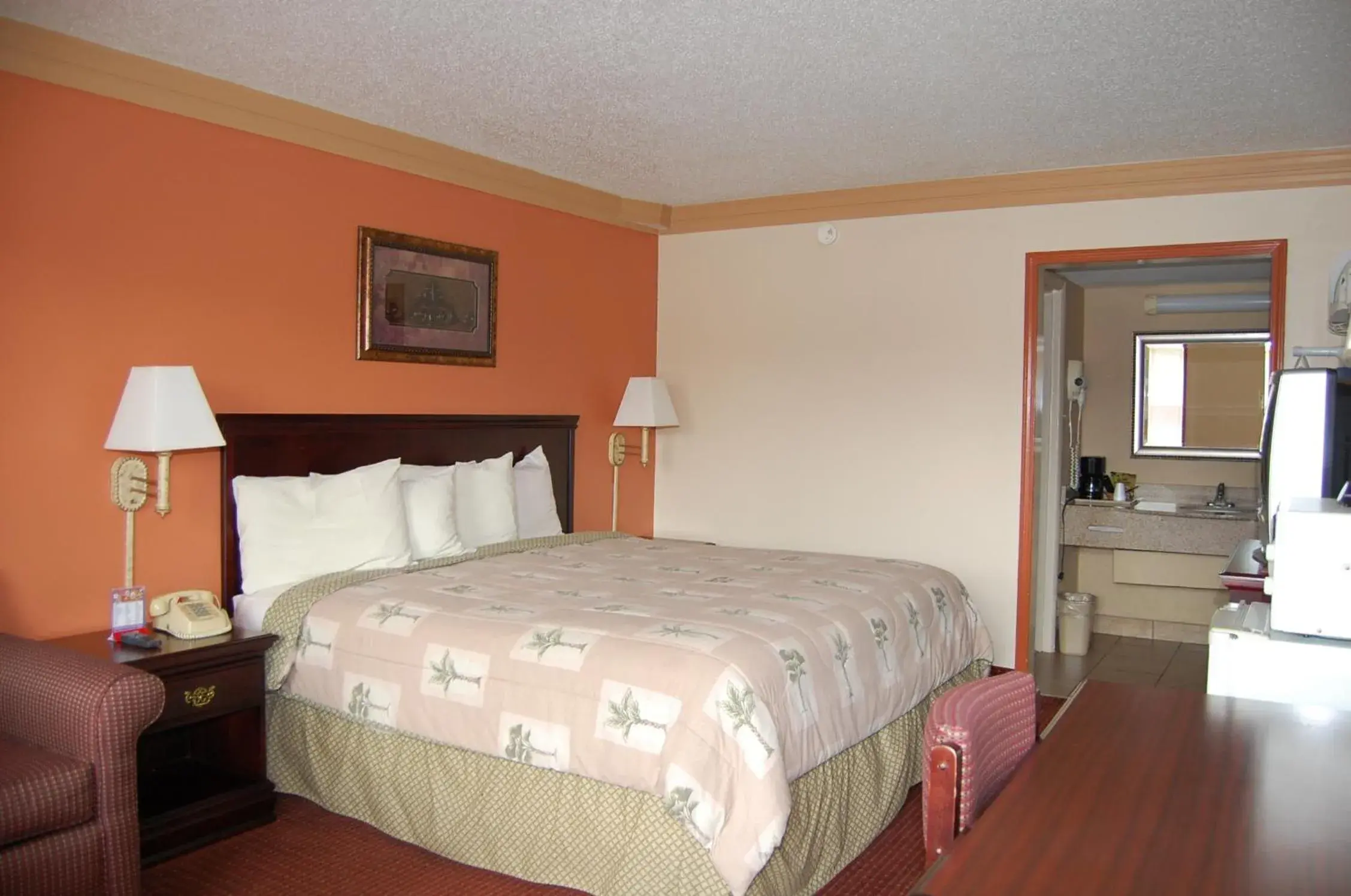 Bed in Executive Inn and Suites Springdale