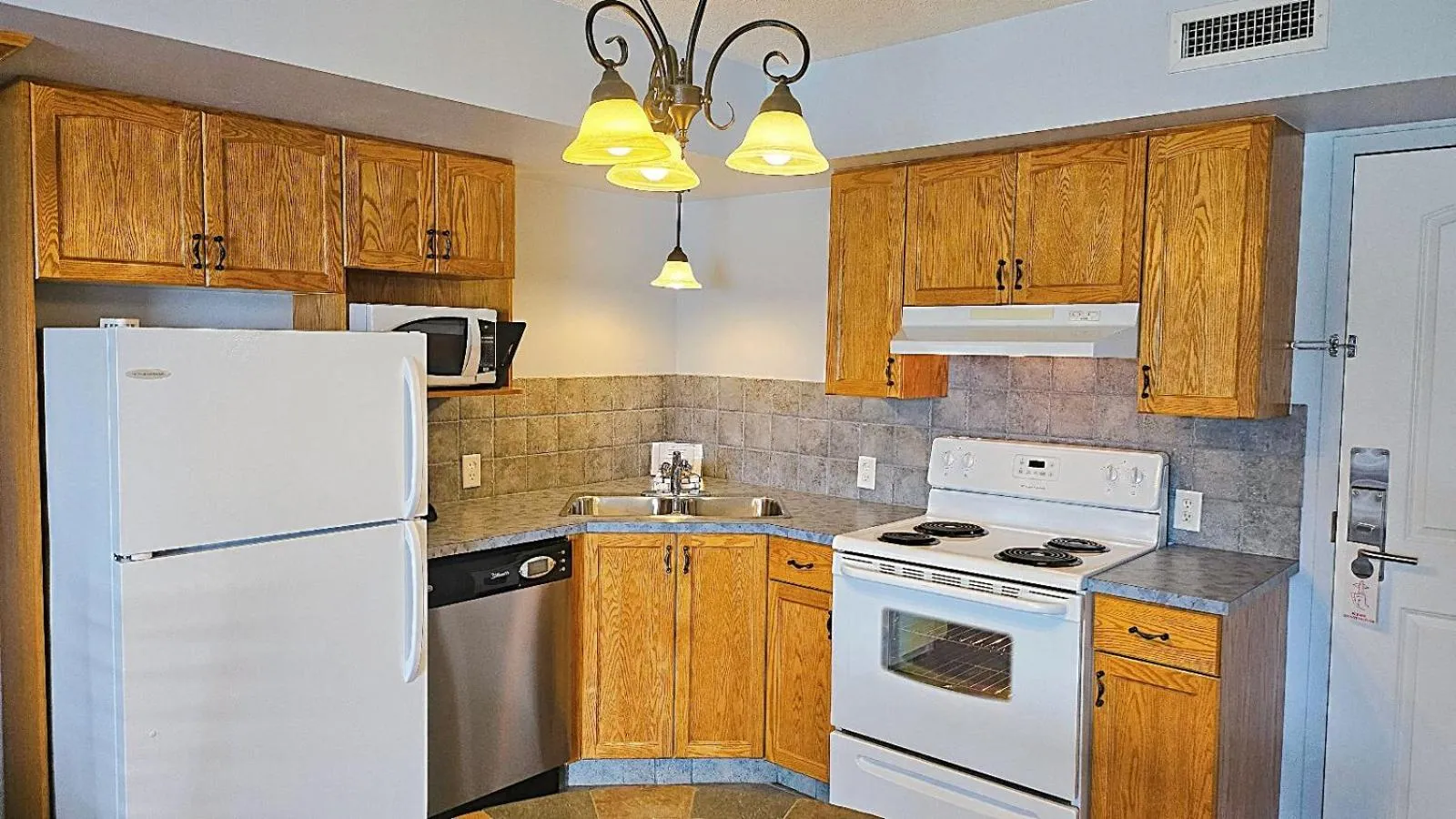 kitchen in Misty Mountain Inn & Suites