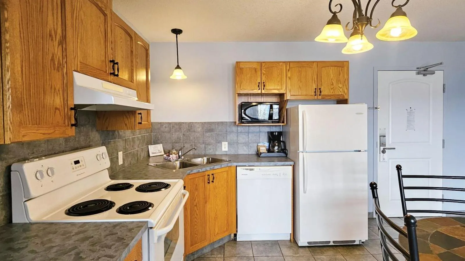 kitchen in Misty Mountain Inn & Suites