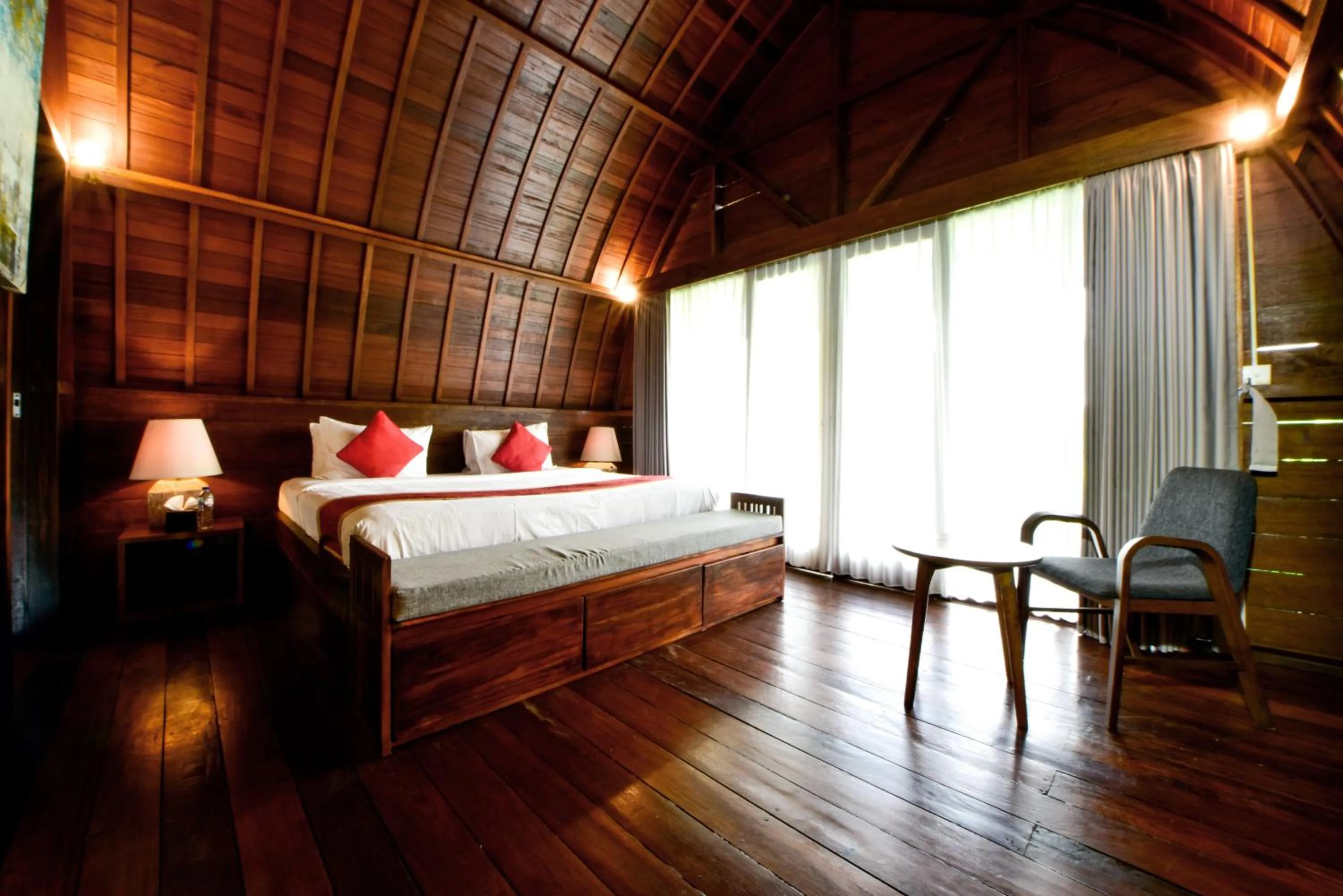 Bed in The Lumbung Wood Villa