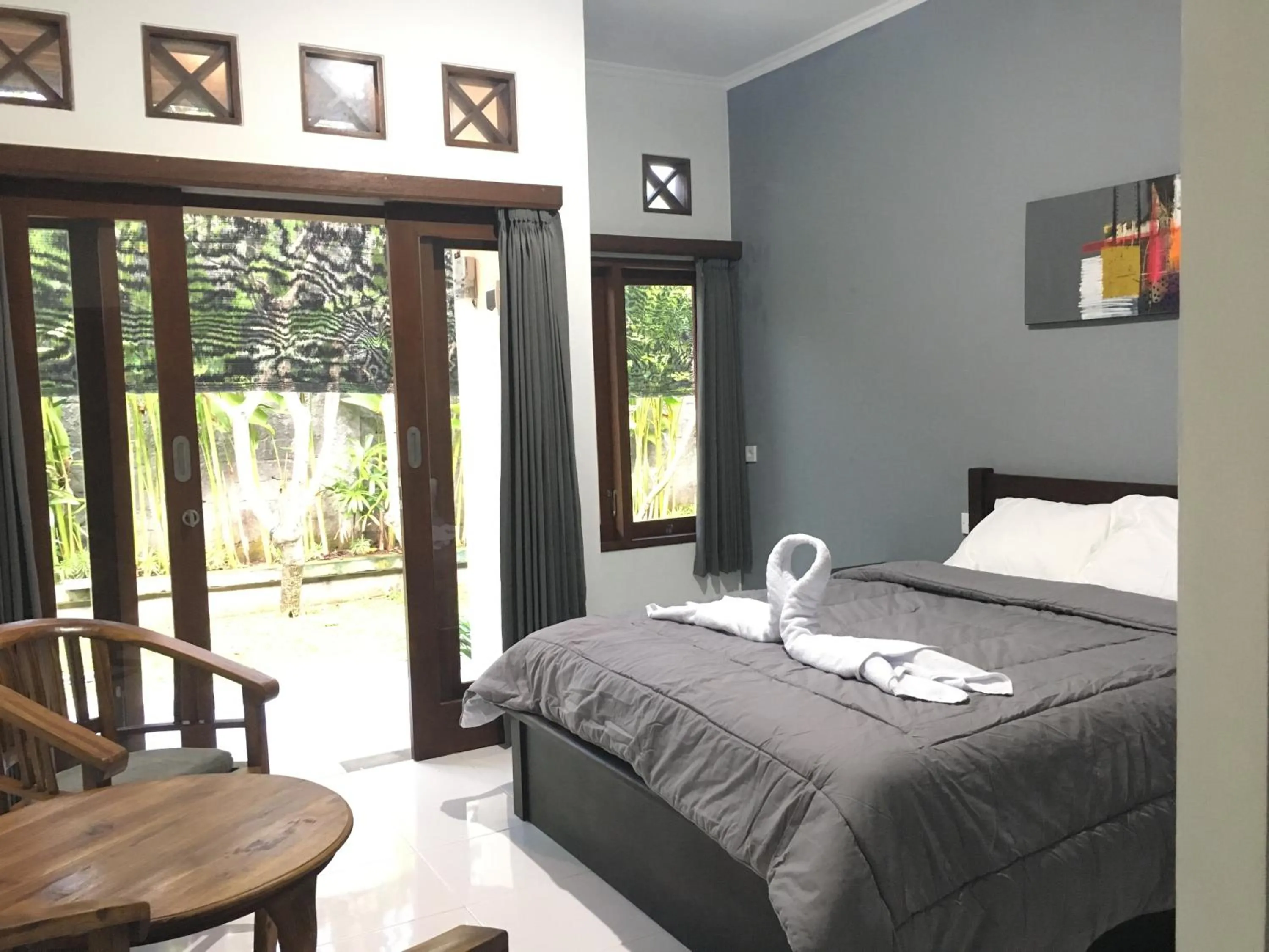 View (from property/room), Bed in Mai Guest House Sanur