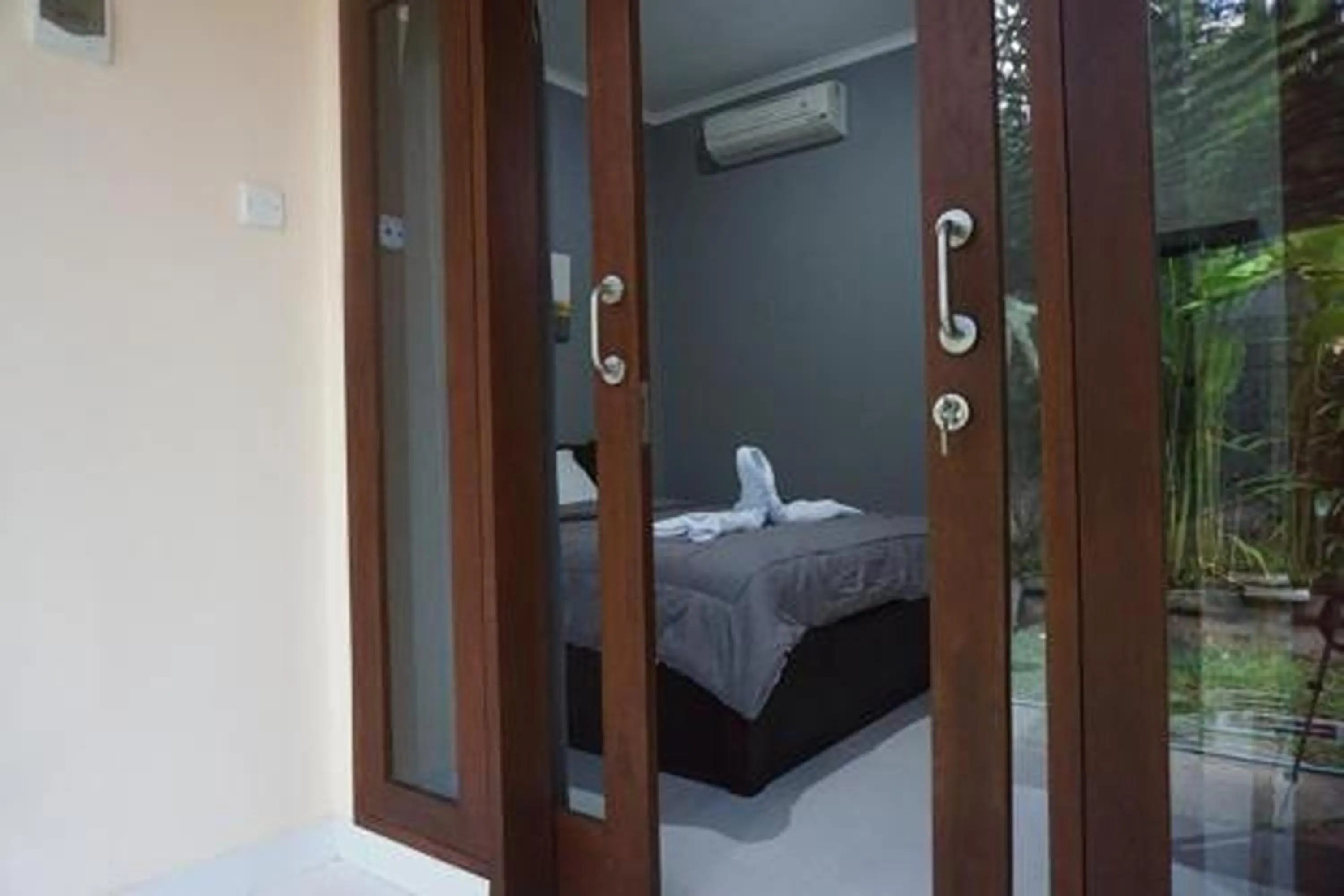 Bed in Mai Guest House Sanur