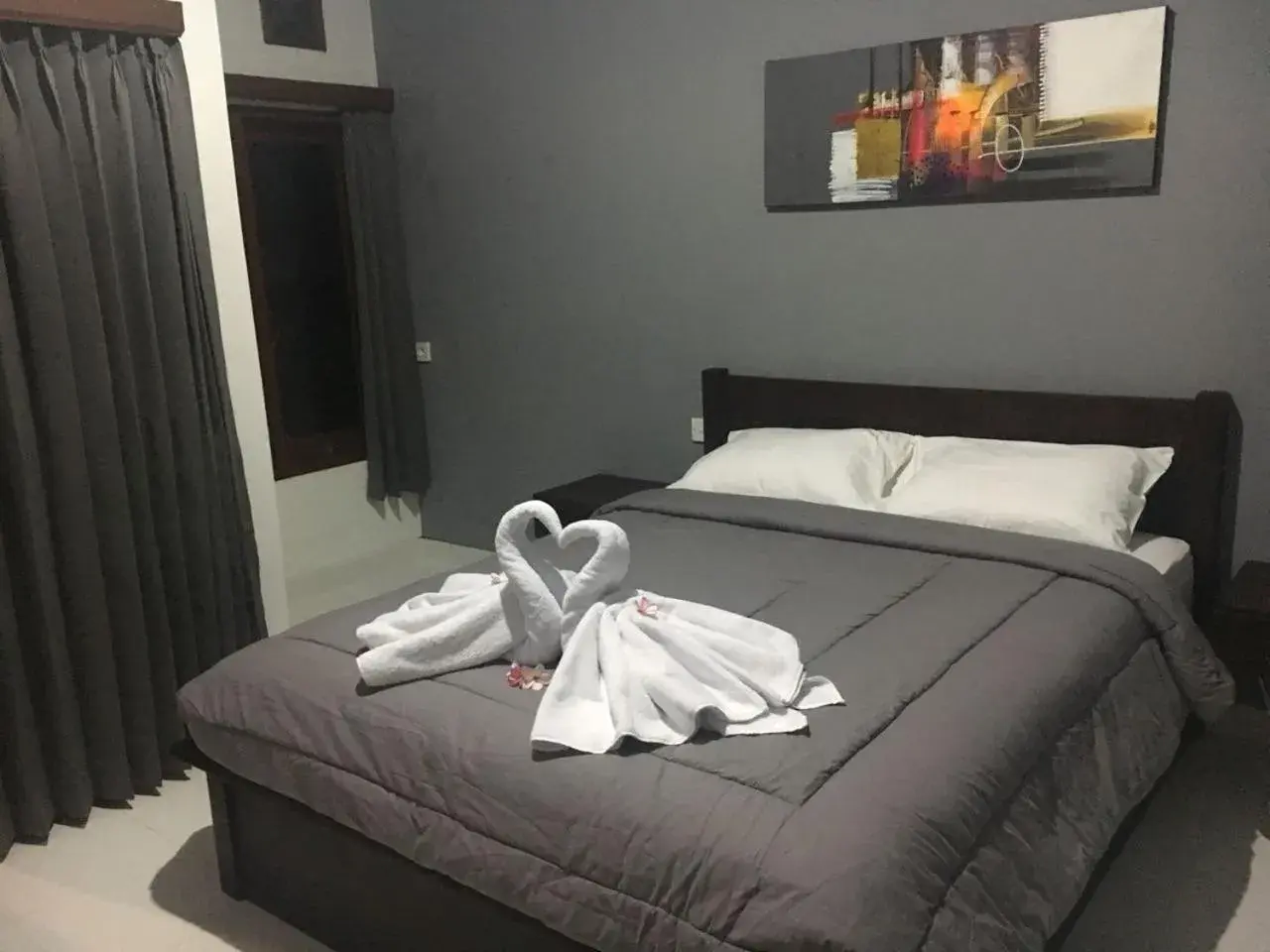 Photo of the whole room, Bed in Mai Guest House Sanur Photo of the whole room, Bed in Mai Guest House Sanur