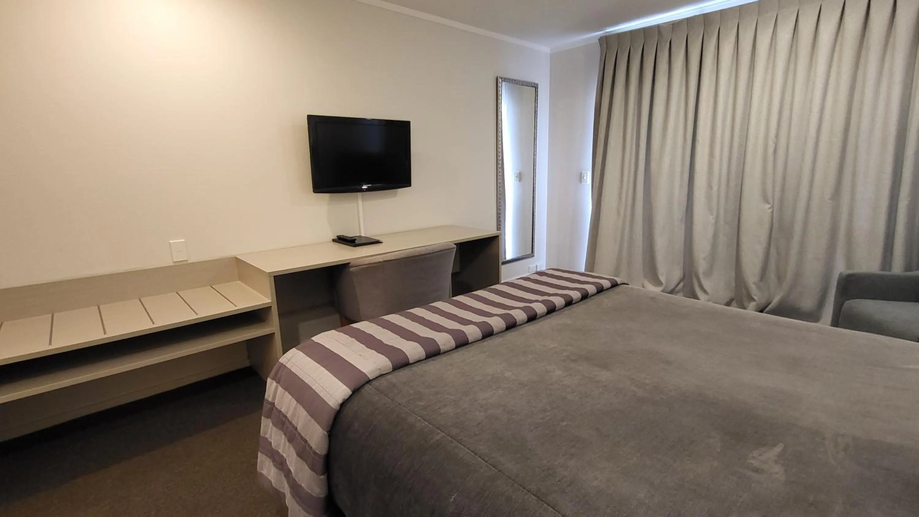 Bed in Manukau Motor Lodge