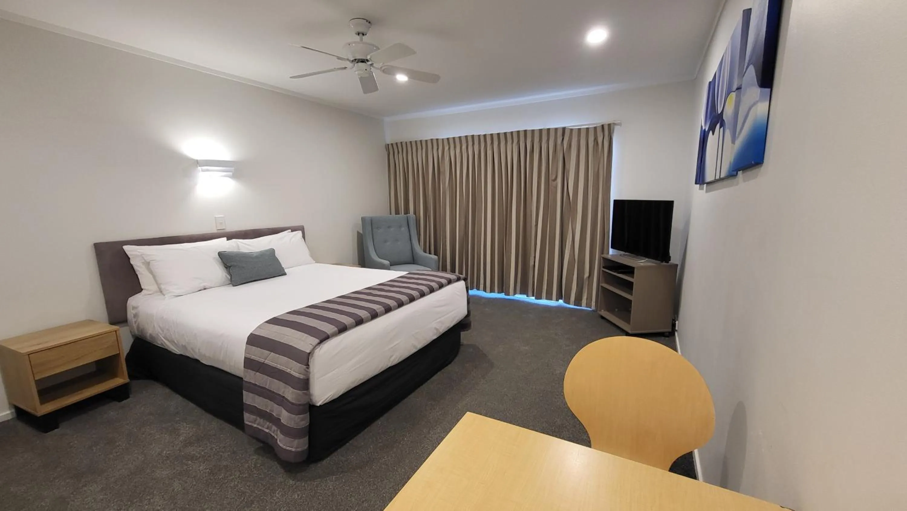 Bed in Manukau Motor Lodge