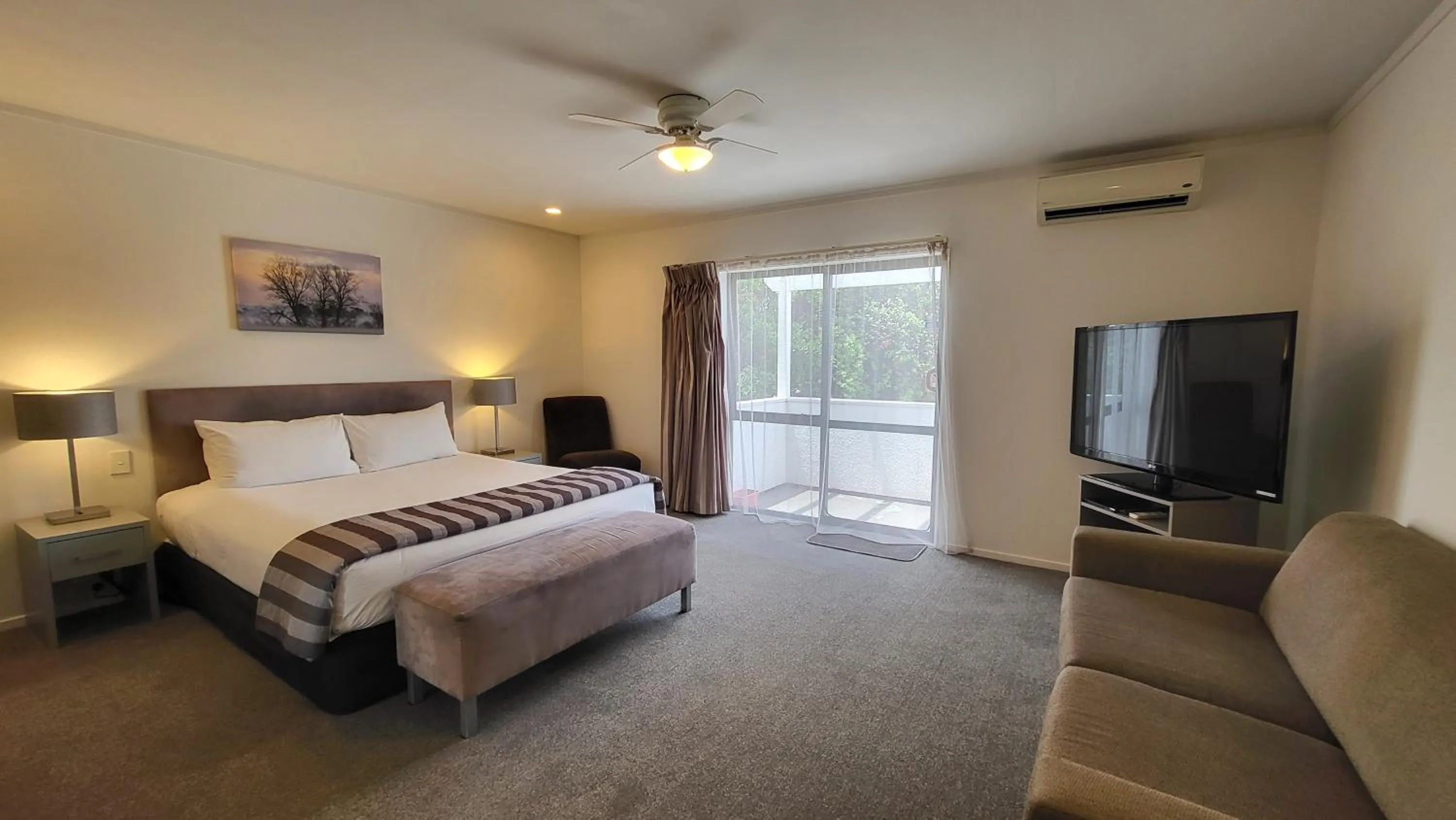 Bed in Manukau Motor Lodge