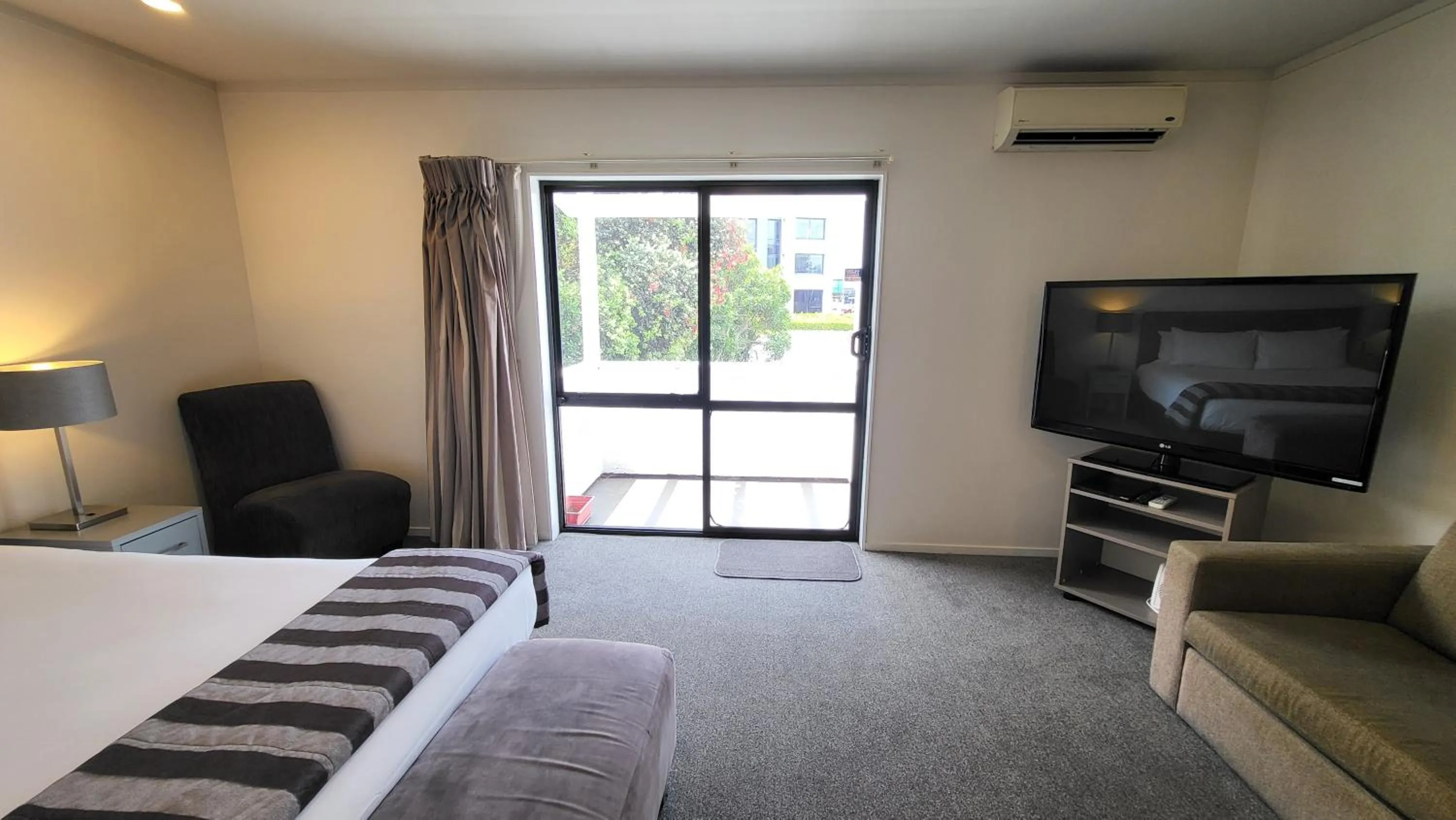 Bed in Manukau Motor Lodge