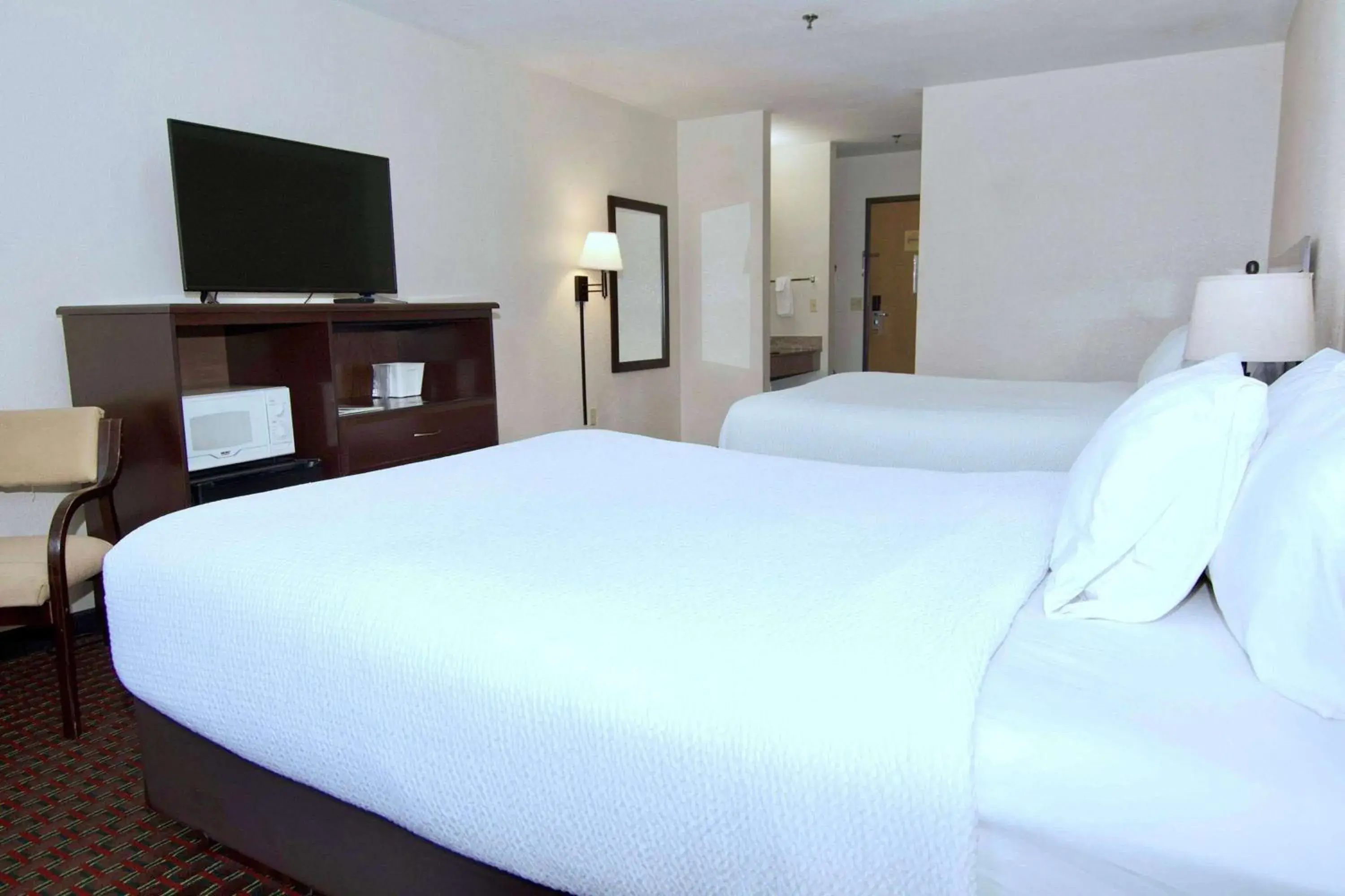 Photo of the whole room, Bed in Ramada by Wyndham Tell City Photo of the whole room, Bed in Ramada by Wyndham Tell City