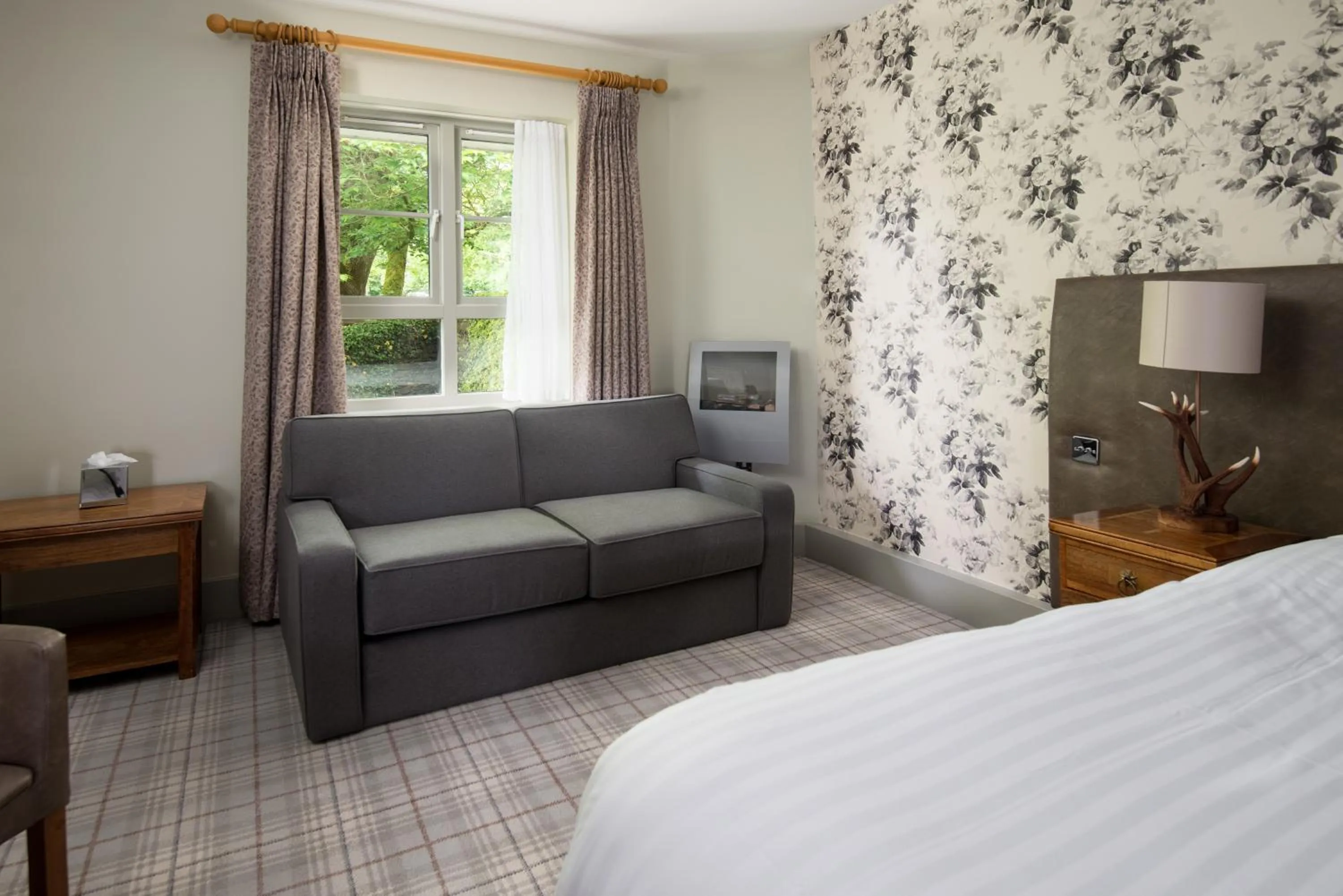 Seating area, Bed in The Waterhead Inn- The Inn Collection Group