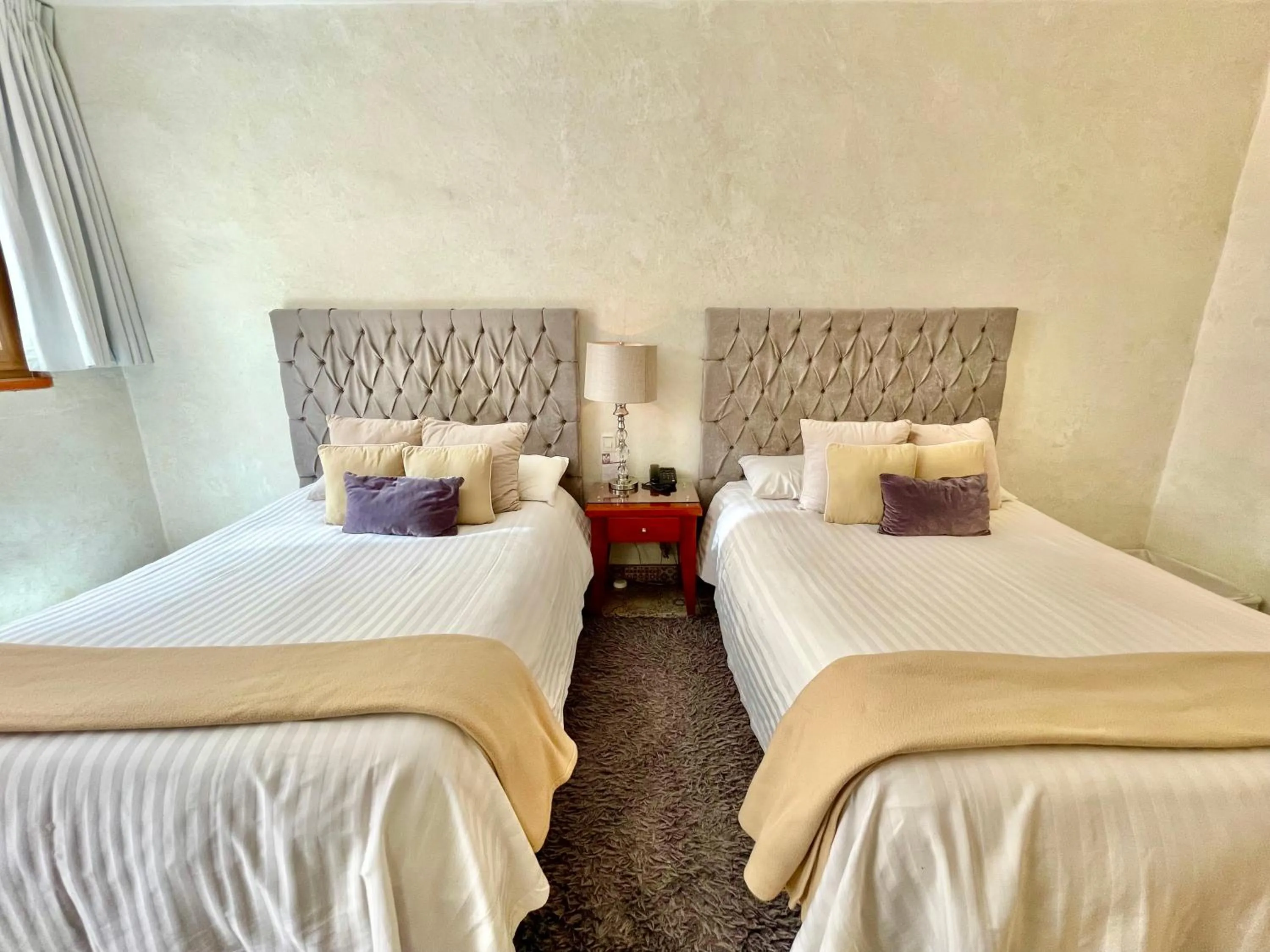 Bed in El Sueño Hotel & Spa