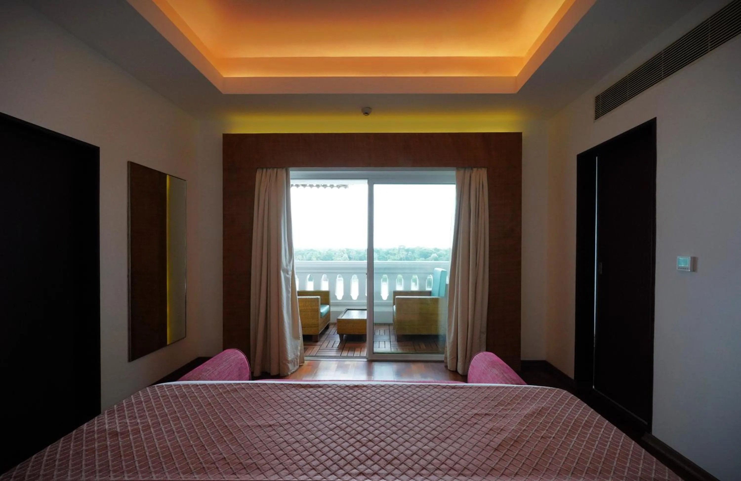 TV and multimedia, Bed in The Leela Ashtamudi, A Raviz Hotel